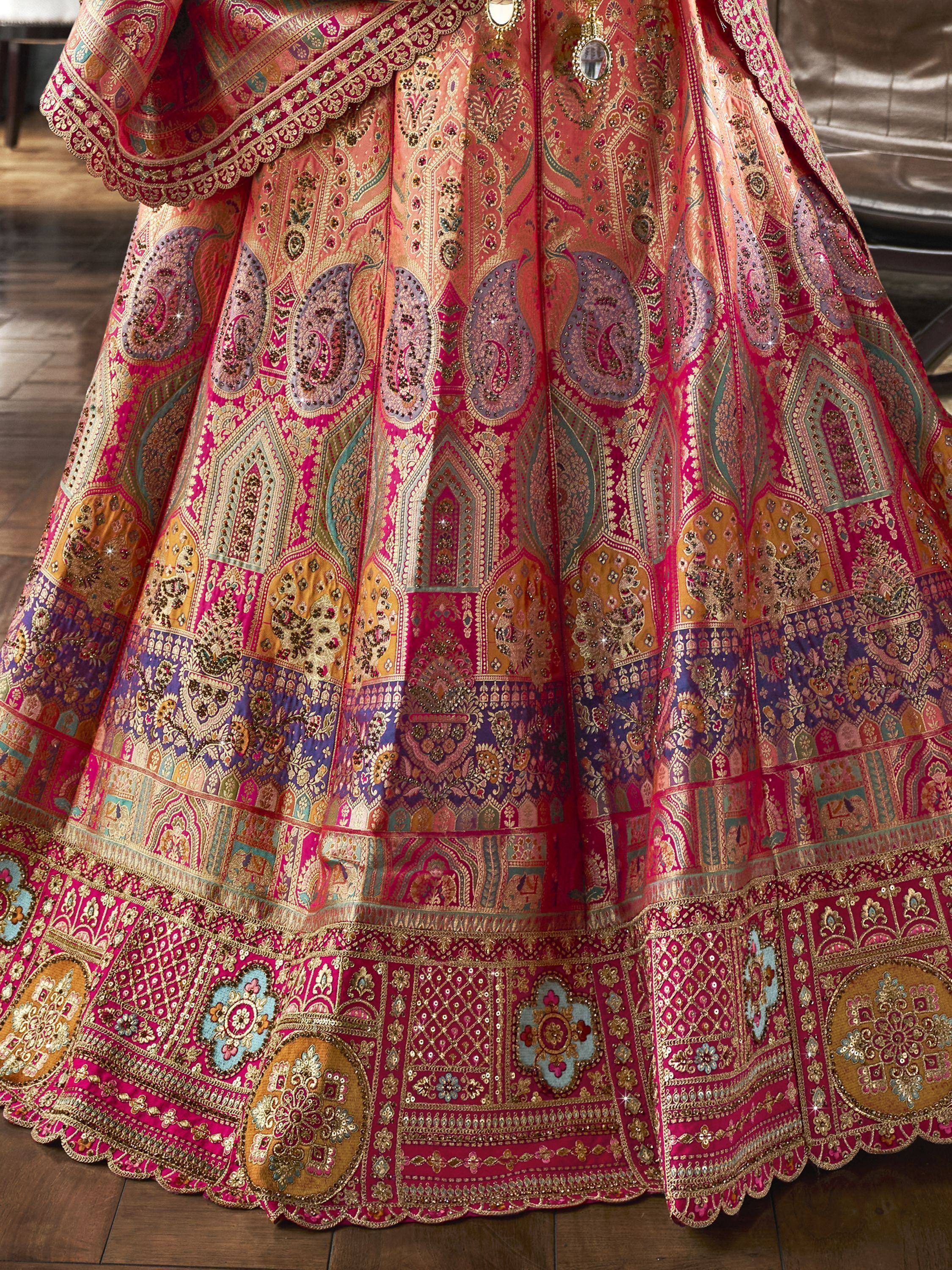 Luxury Indian lehenga choli with intricate paisley embroidery and vibrant colors for festive occasions