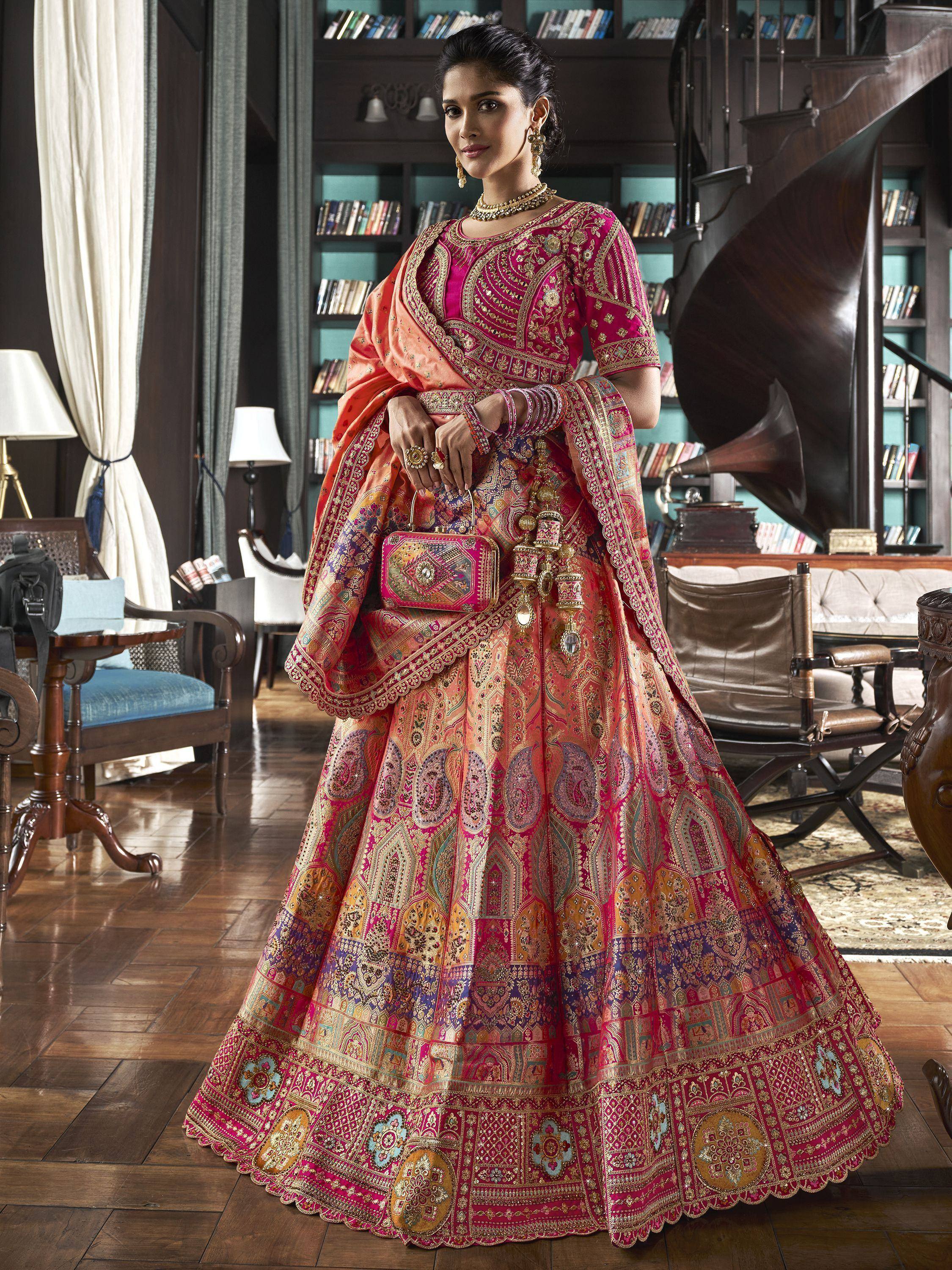 Elegant pink and gold embroidered lehenga choli with matching dupatta, perfect for Indian weddings and festive occasions.
