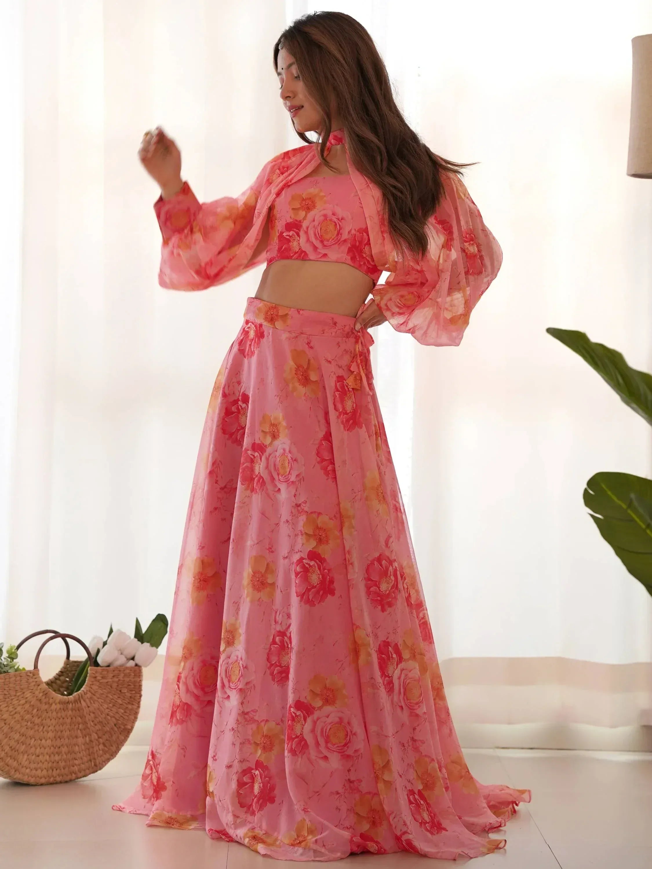 Pink floral ethnic lehenga choli with sheer dupatta, perfect for Indian weddings and festive occasions