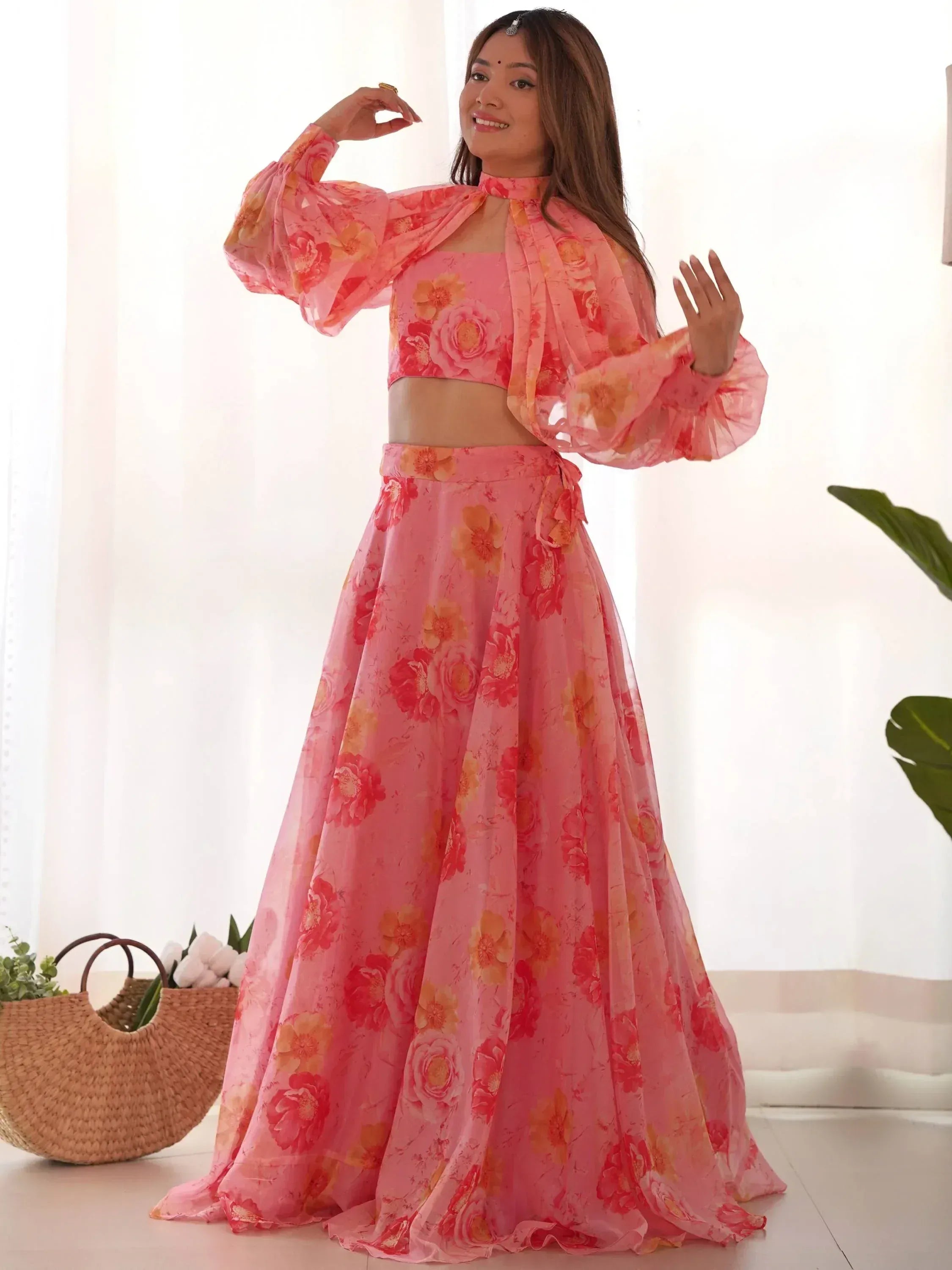 Pink floral lehenga choli with sheer cape, perfect for Indian ethnic wear and festive occasions.