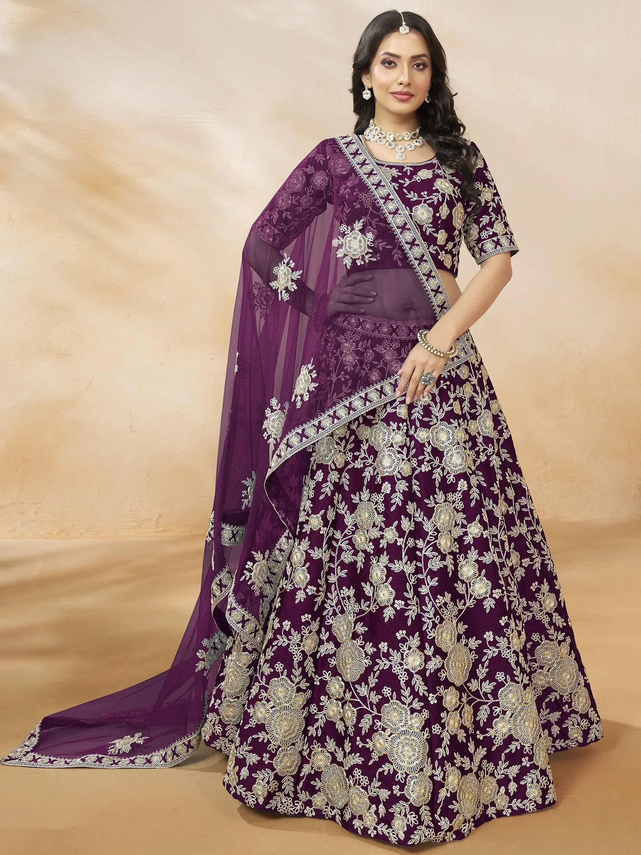 Purple embroidered lehenga choli with gold floral work and sheer dupatta for Indian ethnic wear