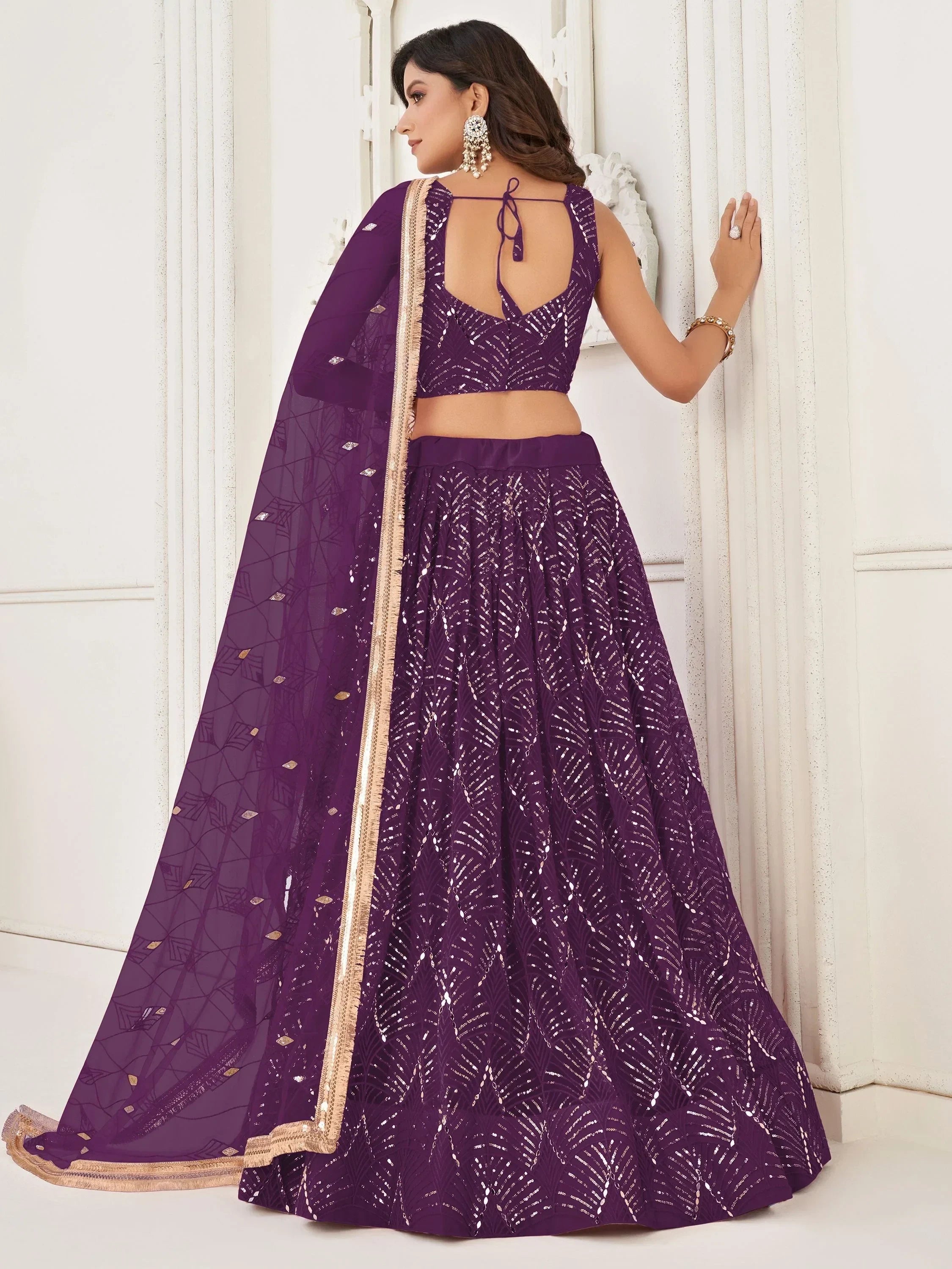 Purple sequin lehenga choli with gold trim, back view, Indian ethnic wear