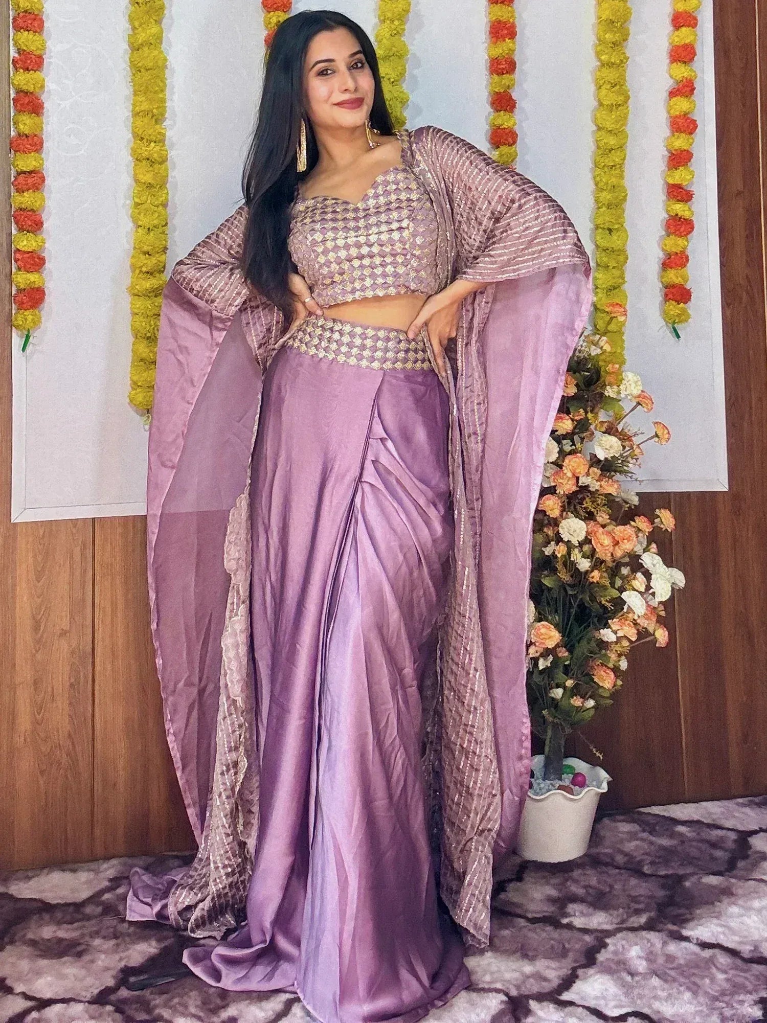 Purple designer lehenga choli with embroidered blouse and sheer cape, perfect for Indian ethnic occasions