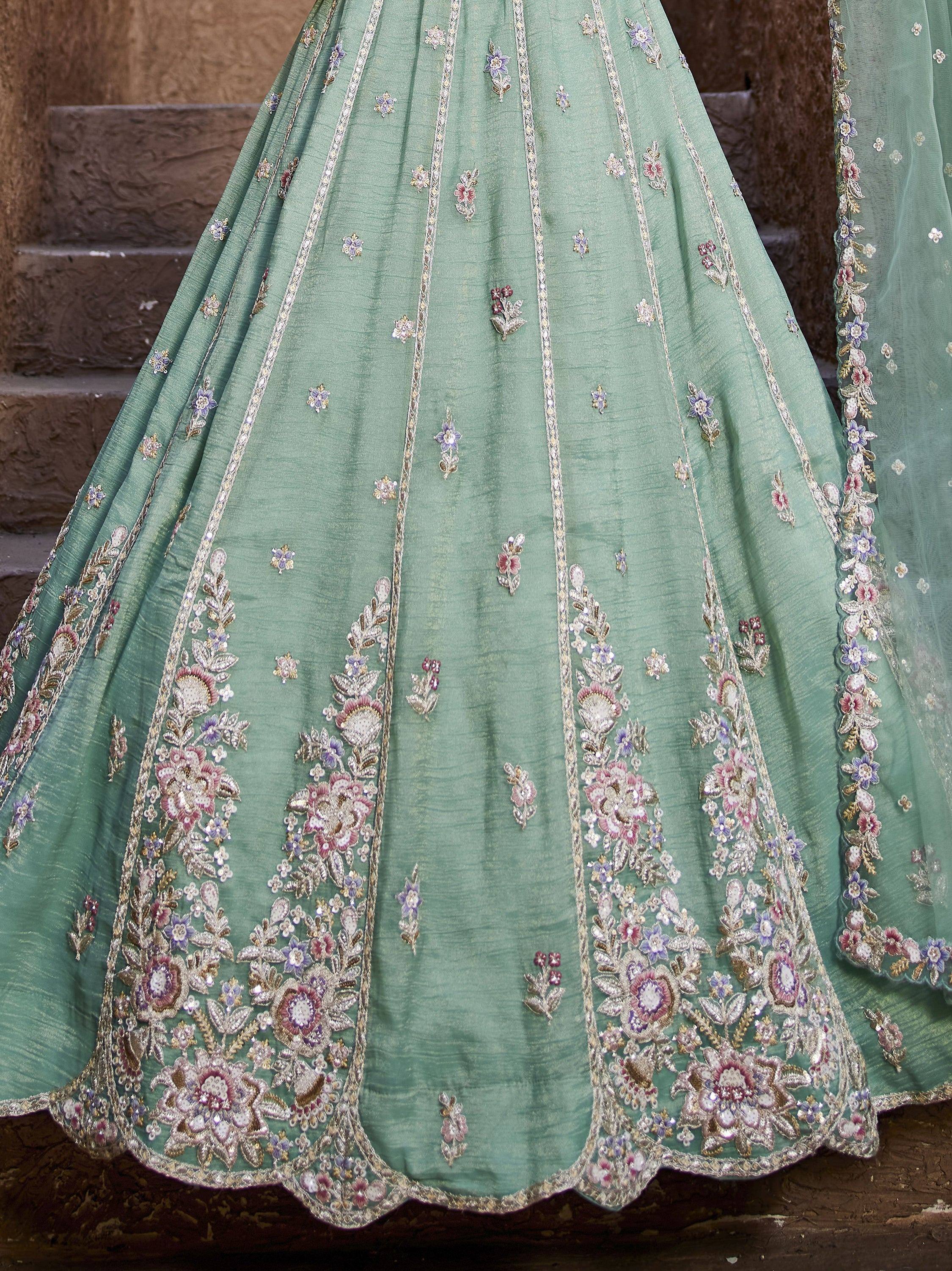 Mint green lehenga with intricate floral embroidery and sequin detailing, perfect for Indian ethnic wear