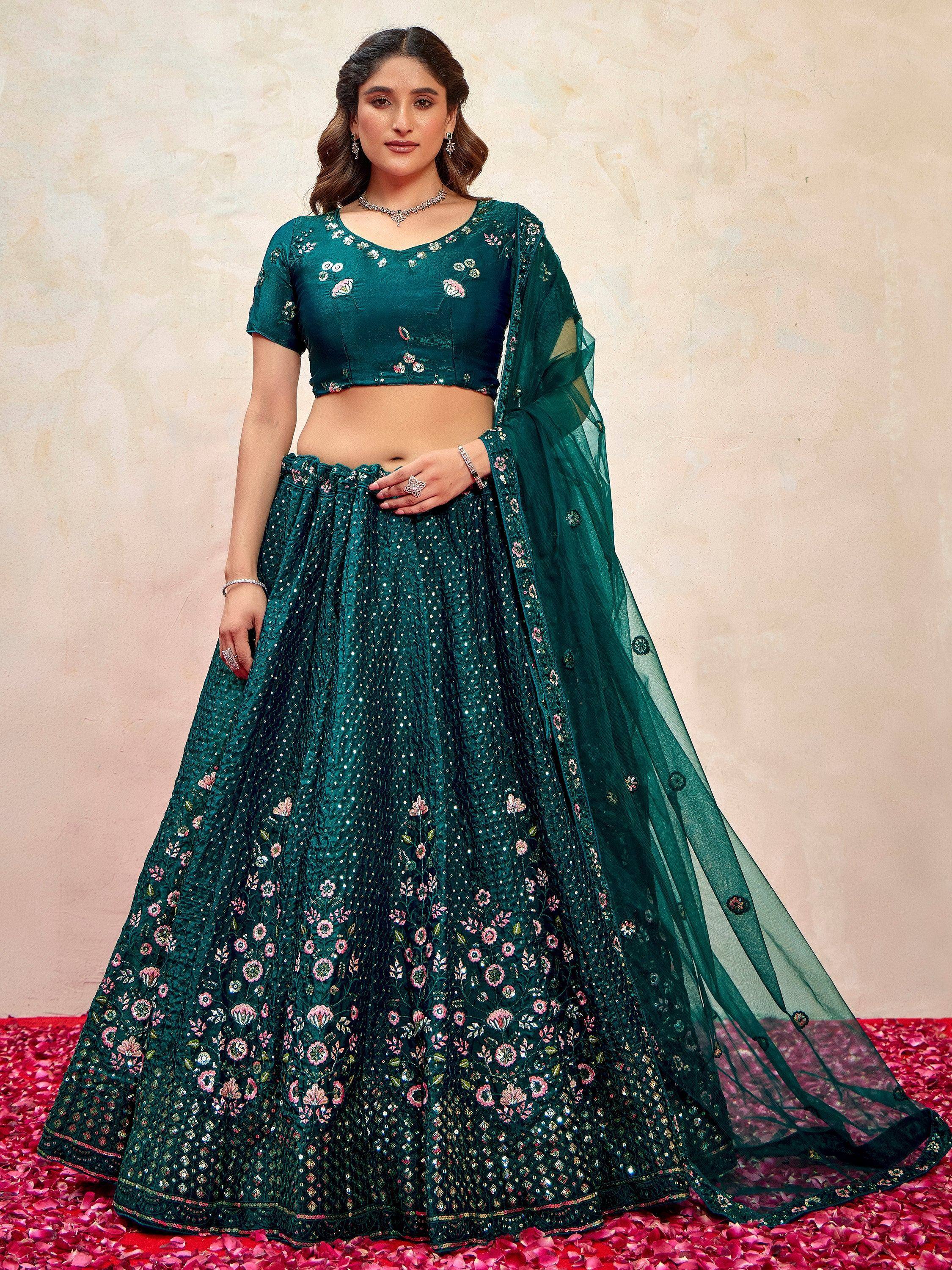 Emerald green designer lehenga choli with floral embroidery and sequins, perfect for Indian weddings and festive occasions