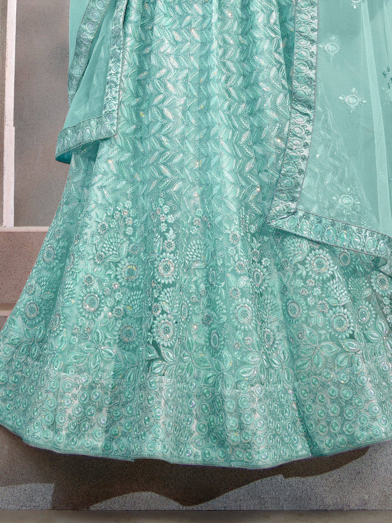 Mint green embroidered lehenga choli with floral zari work and sequin detailing, perfect for Indian ethnic wear.