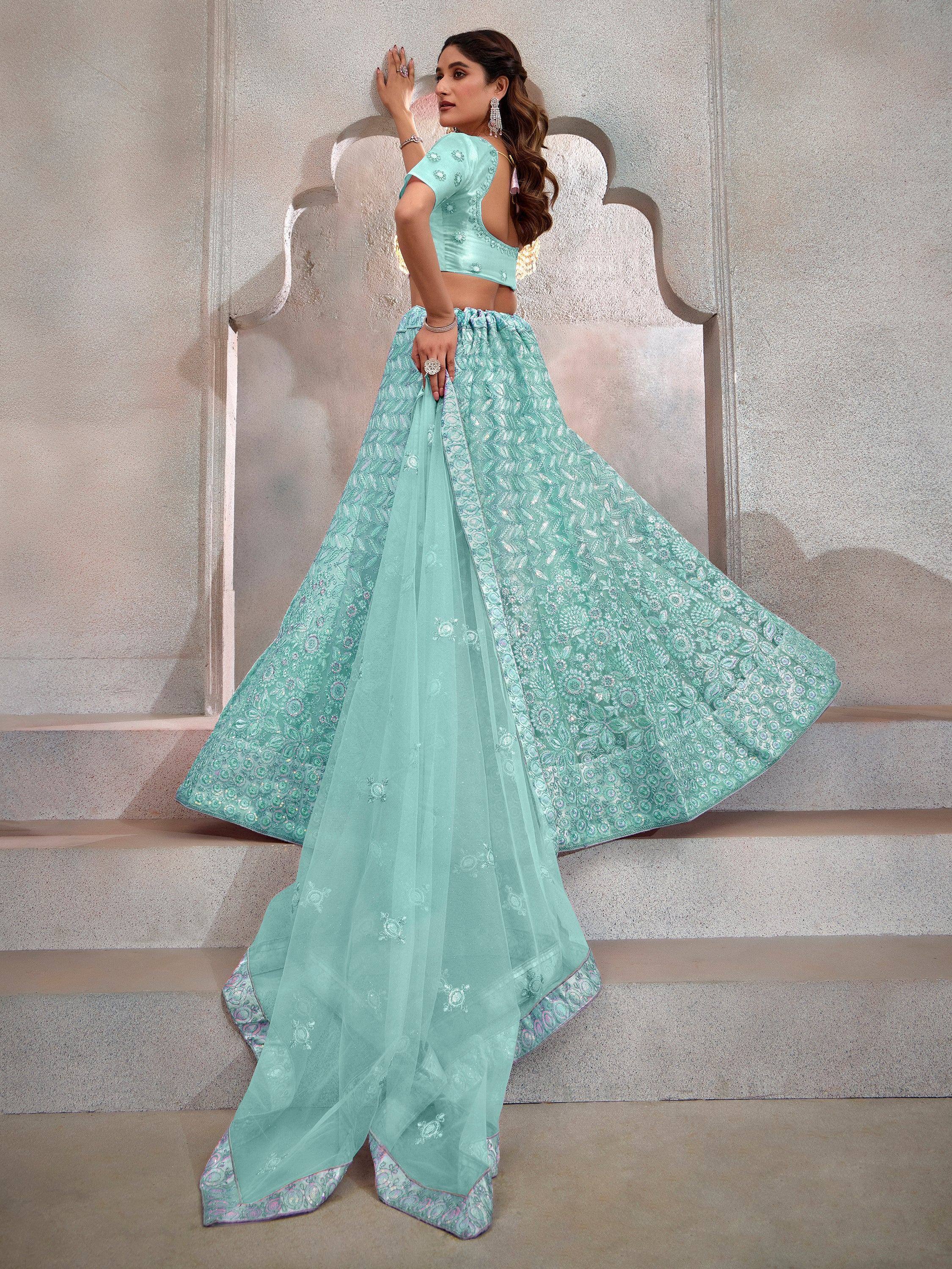 Mint green designer lehenga choli with floral embroidery, perfect for Indian ethnic wear occasions