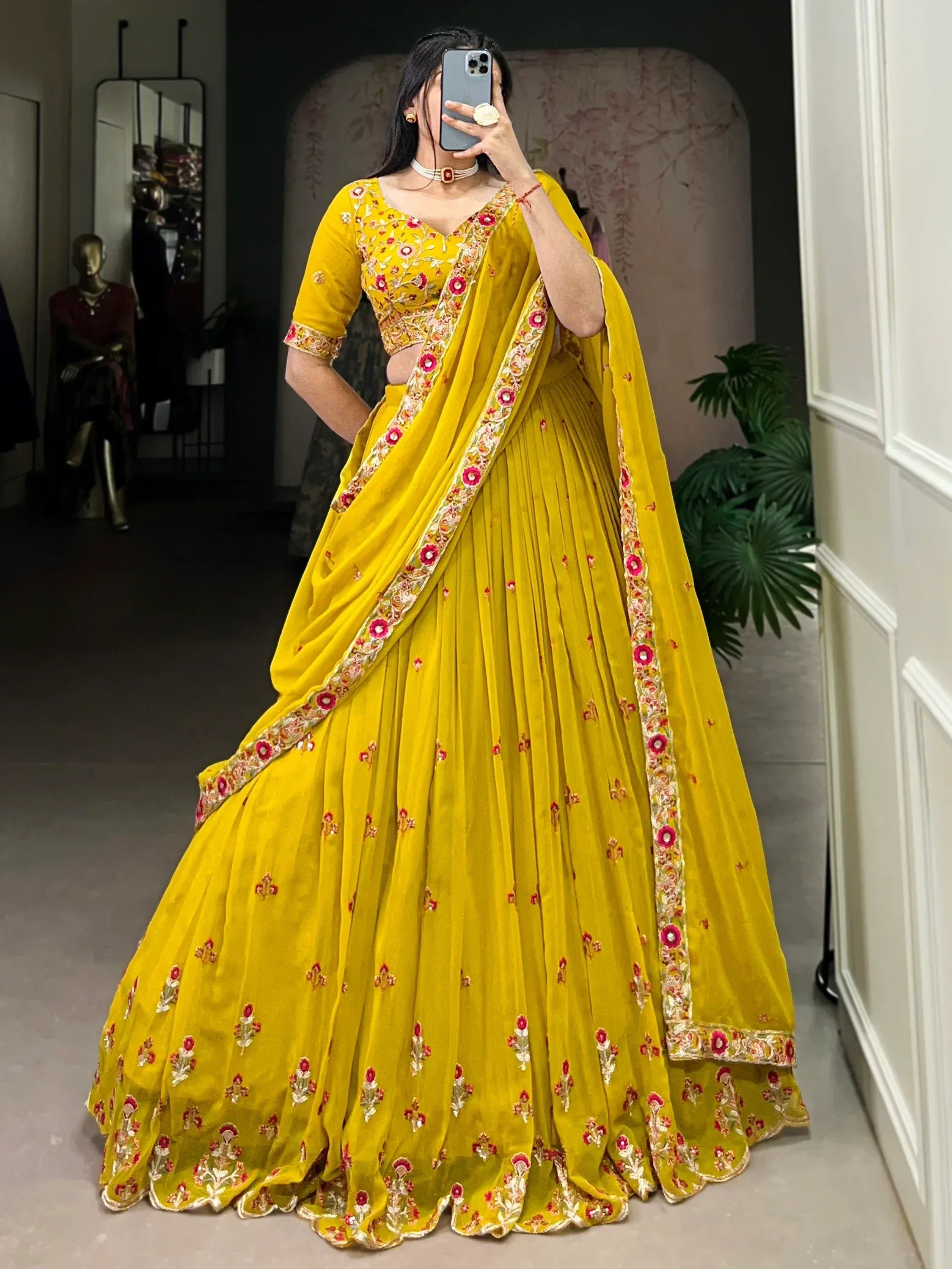 Yellow floral embroidered lehenga choli with matching dupatta, perfect for Indian ethnic wear occasions