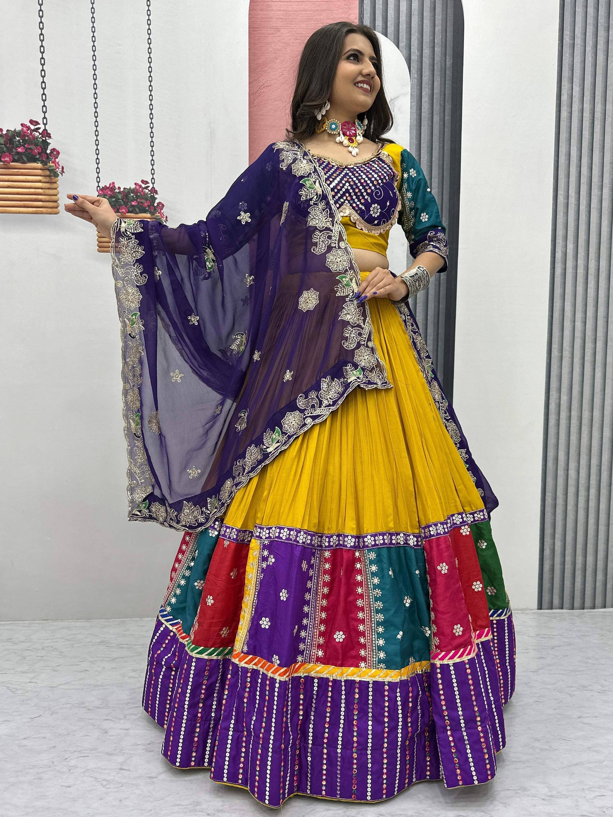 Vibrant yellow and purple embroidered lehenga choli with colorful dupatta, perfect for Indian ethnic wear.