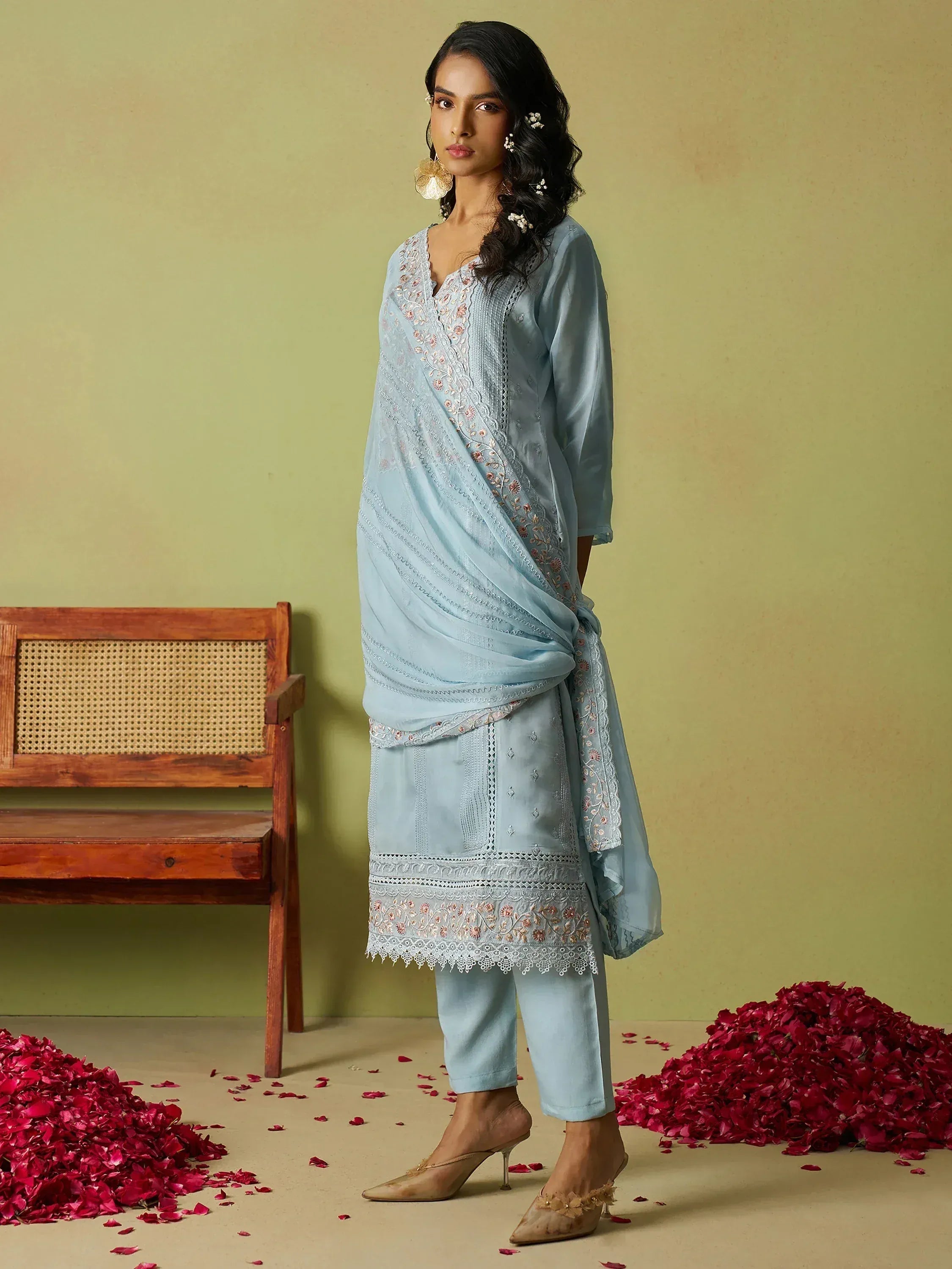 Light blue embroidered salwar kameez with floral details, perfect for ethnic occasions and festive wear.