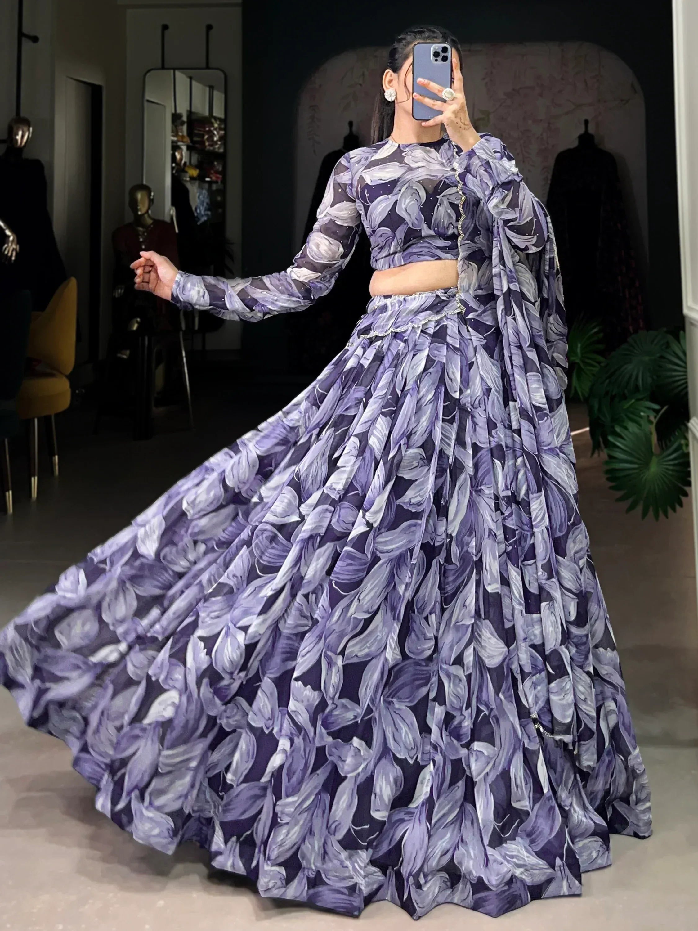 Purple floral print lehenga choli with sheer long sleeves, perfect for Indian ethnic wear events.
