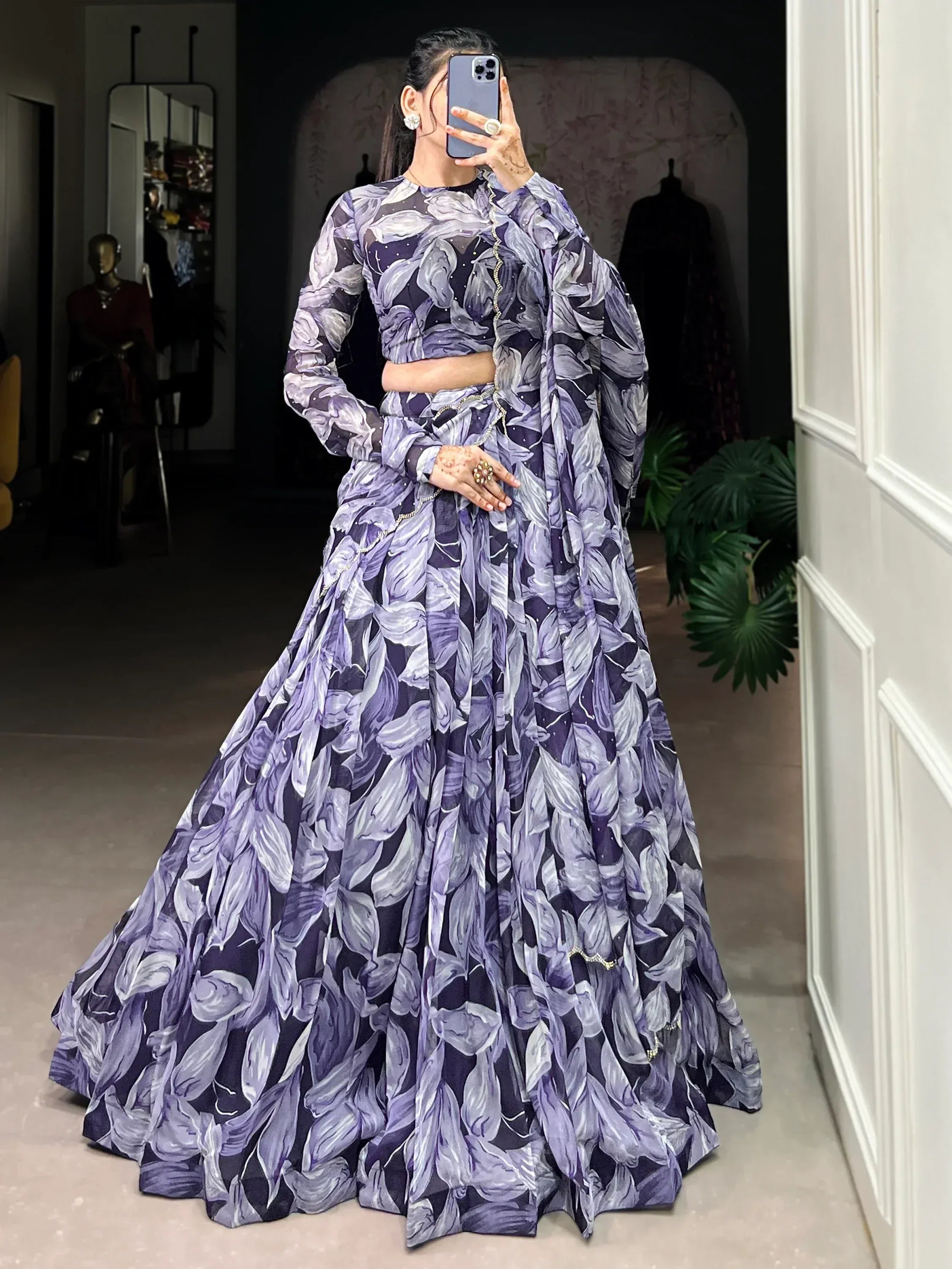 Purple floral print lehenga choli with long sleeves and embellished border, perfect for Indian ethnic wear occasions