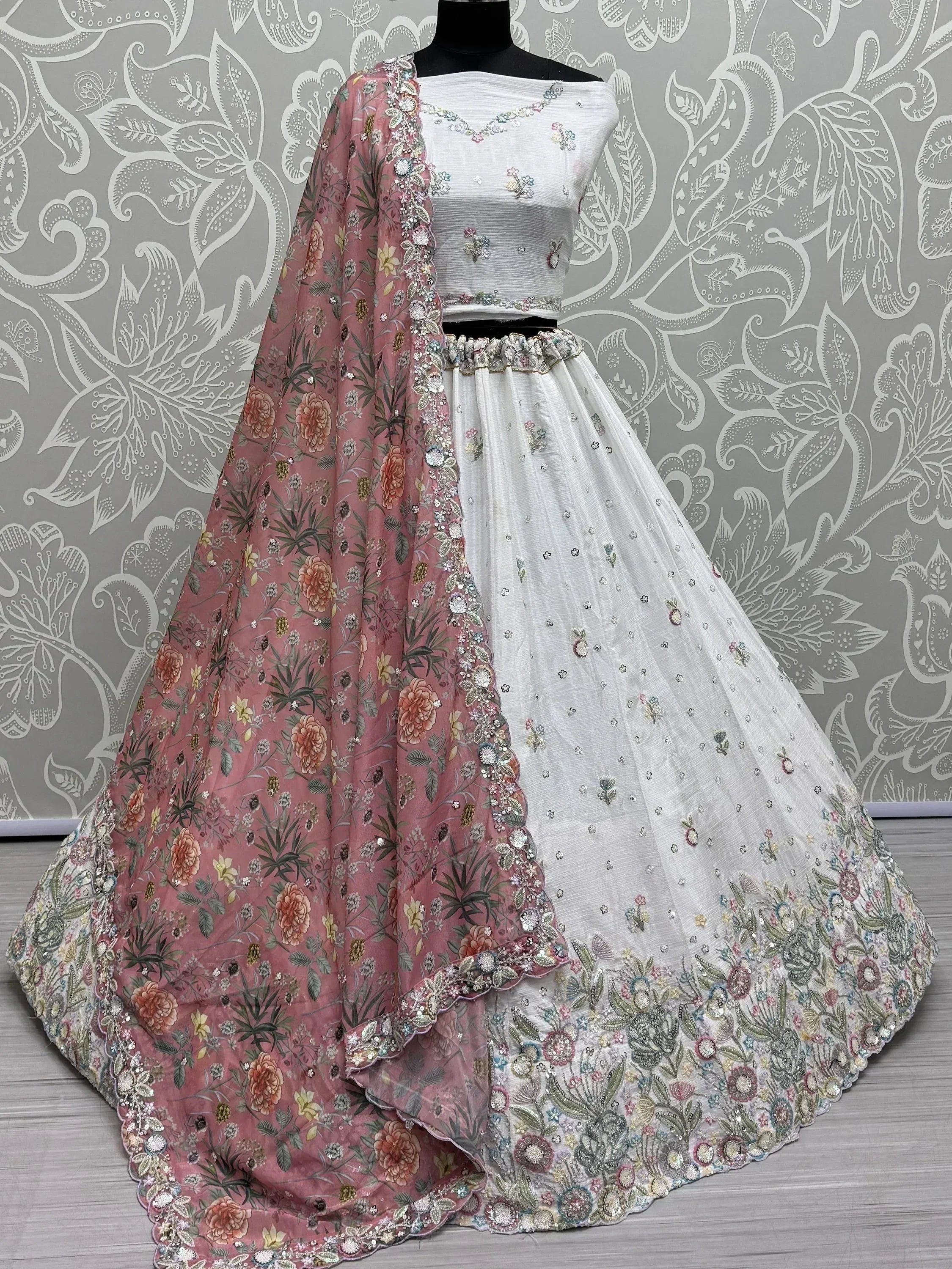 White floral embroidered lehenga choli with pink dupatta, Indian ethnic wear for weddings and parties