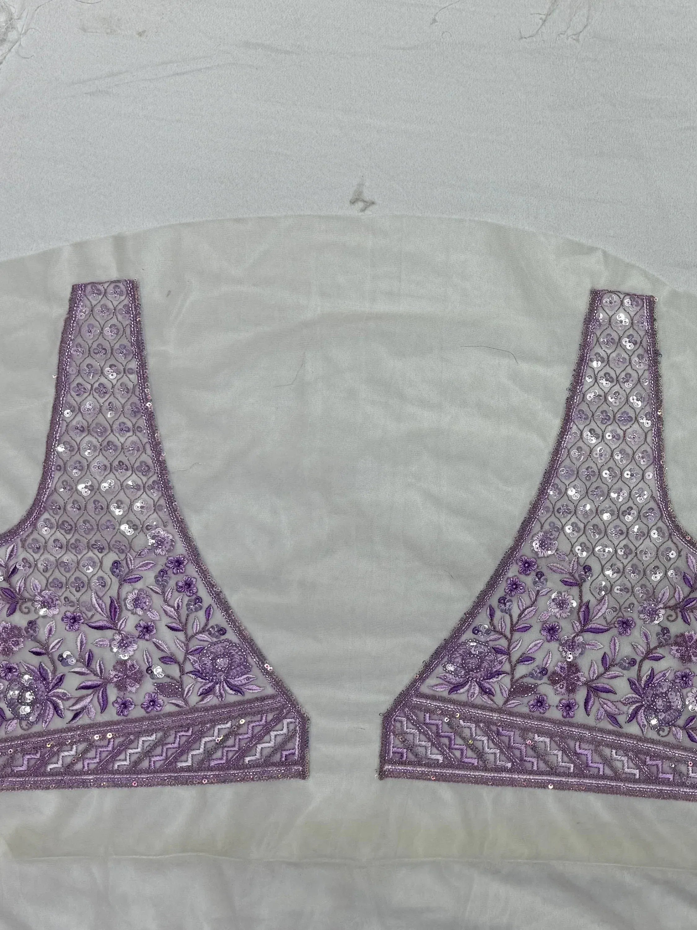 Purple embroidered lehenga choli blouse with floral sequin work and sheer net detailing