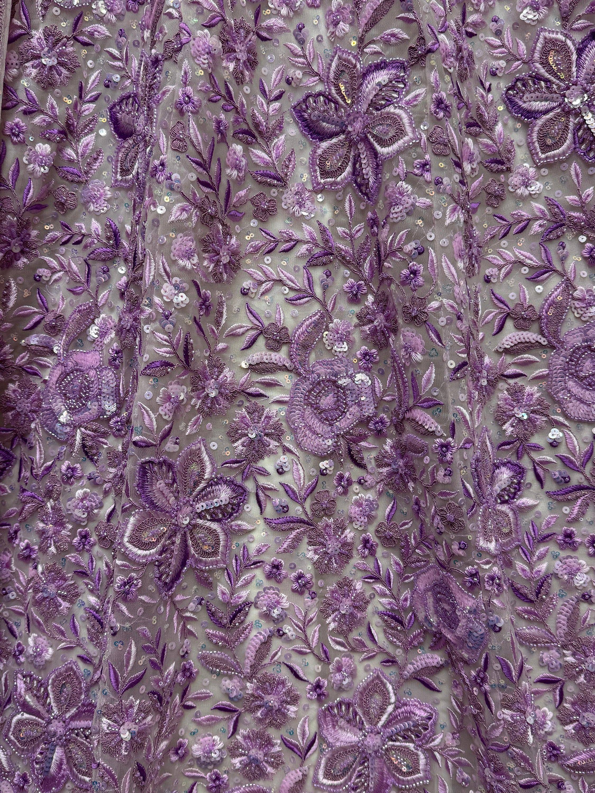 Purple floral embroidered net fabric with sequins for ethnic wear