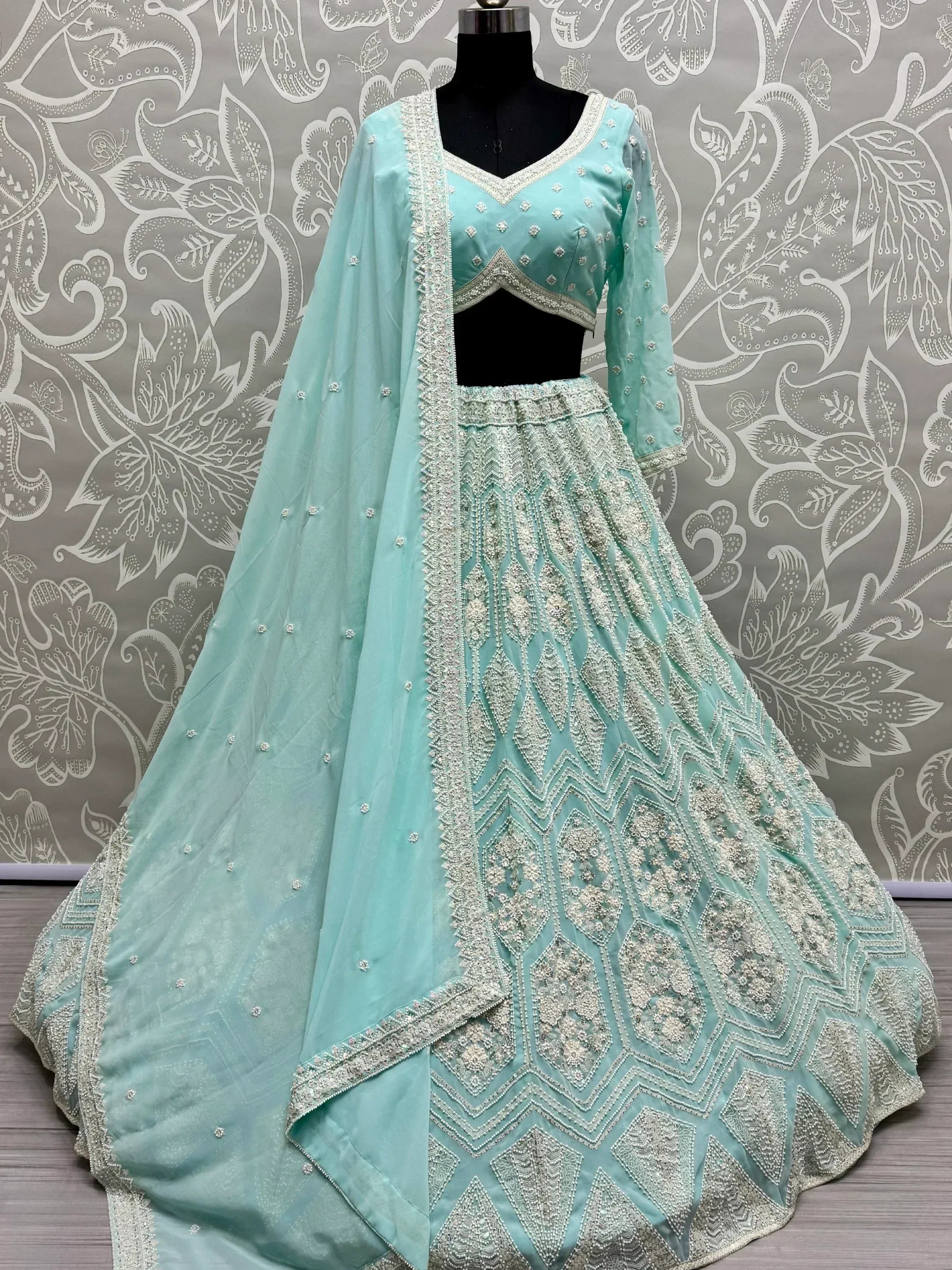 Mint green designer lehenga choli with silver embroidery and dupatta, ethnic Indian wear