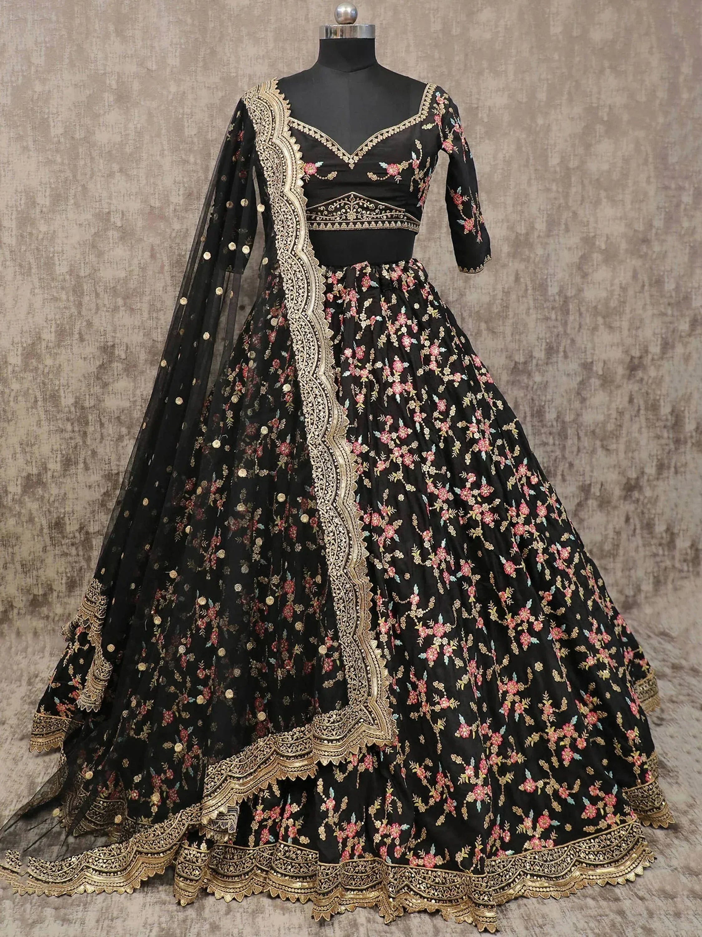 Black floral embroidered lehenga choli with gold detailing and dupatta, Indian ethnic wear
