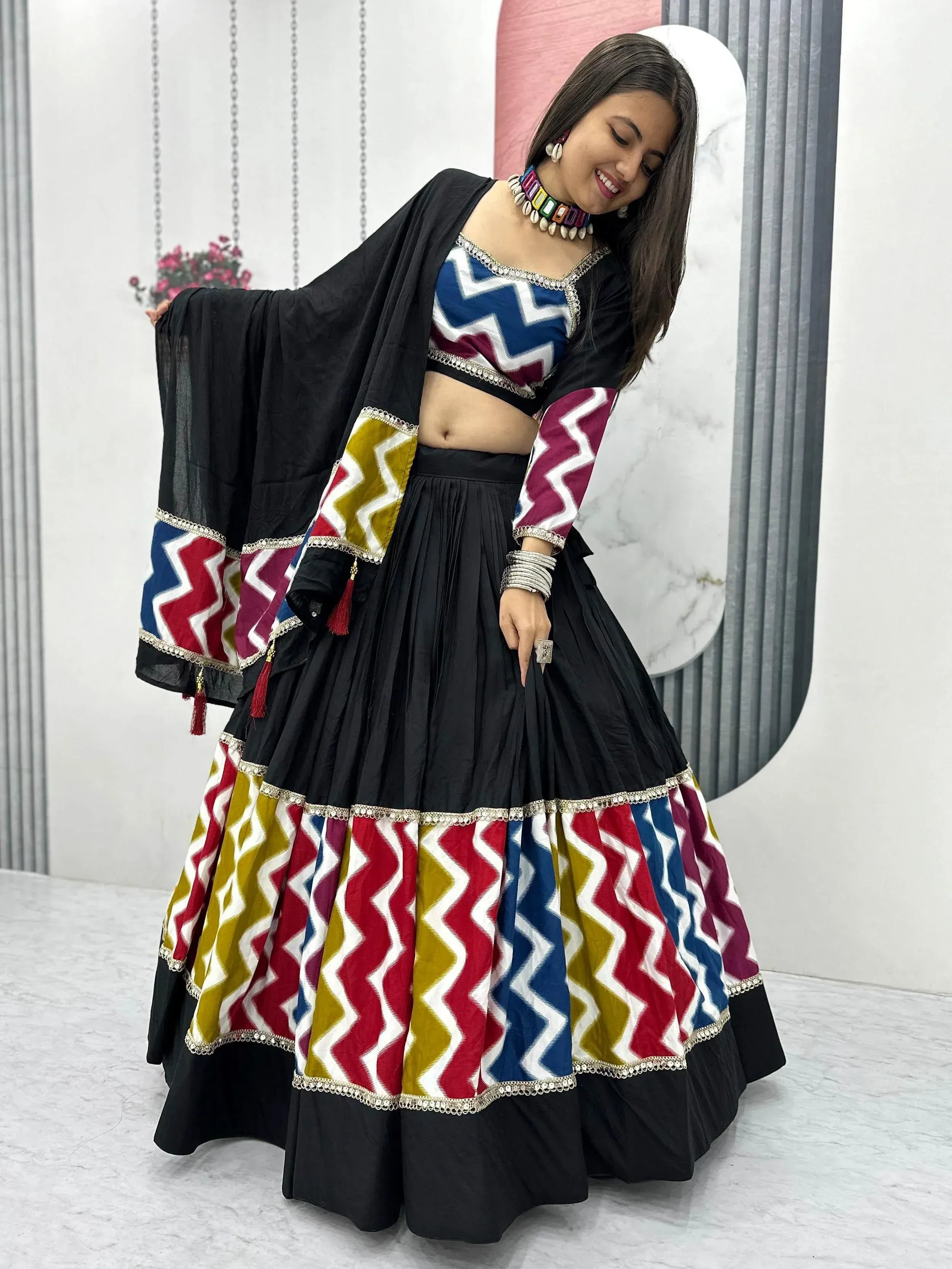Black lehenga choli with colorful zigzag print, ethnic wear for women