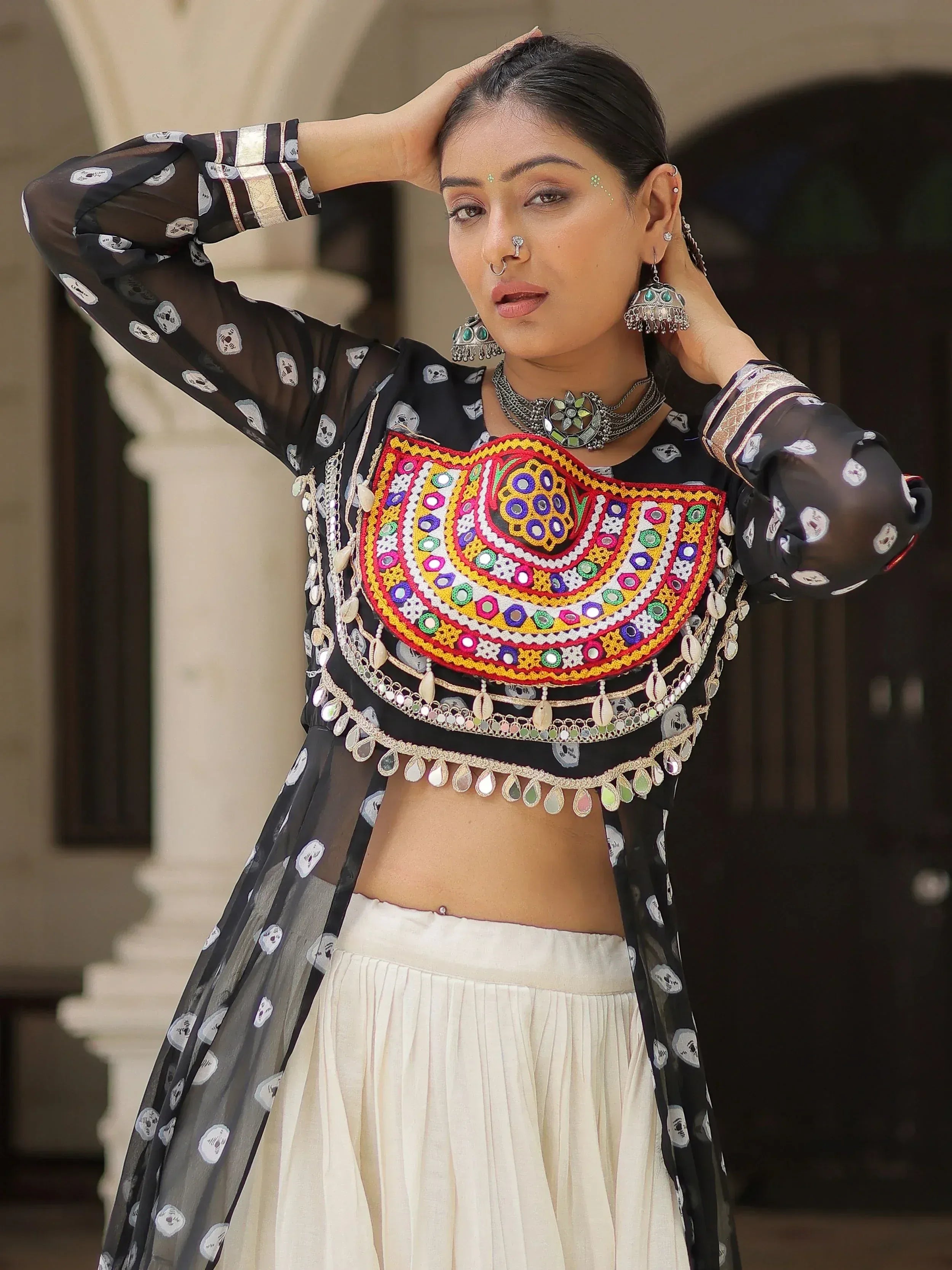 Black sheer embroidered top with mirror work, paired with white skirt, Indian ethnic wear