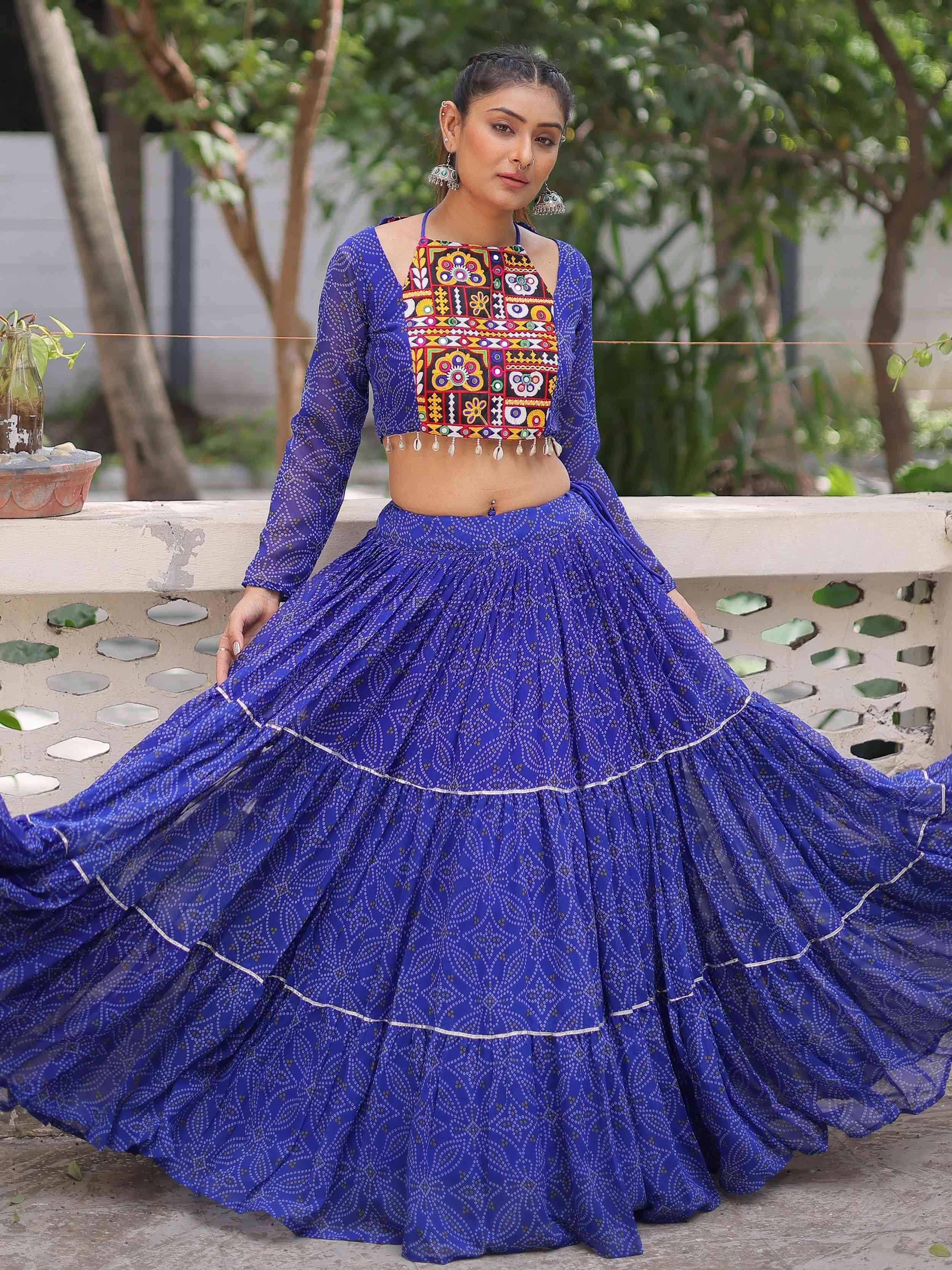 Blue printed lehenga choli with colorful embroidered crop top, perfect for Indian ethnic wear
