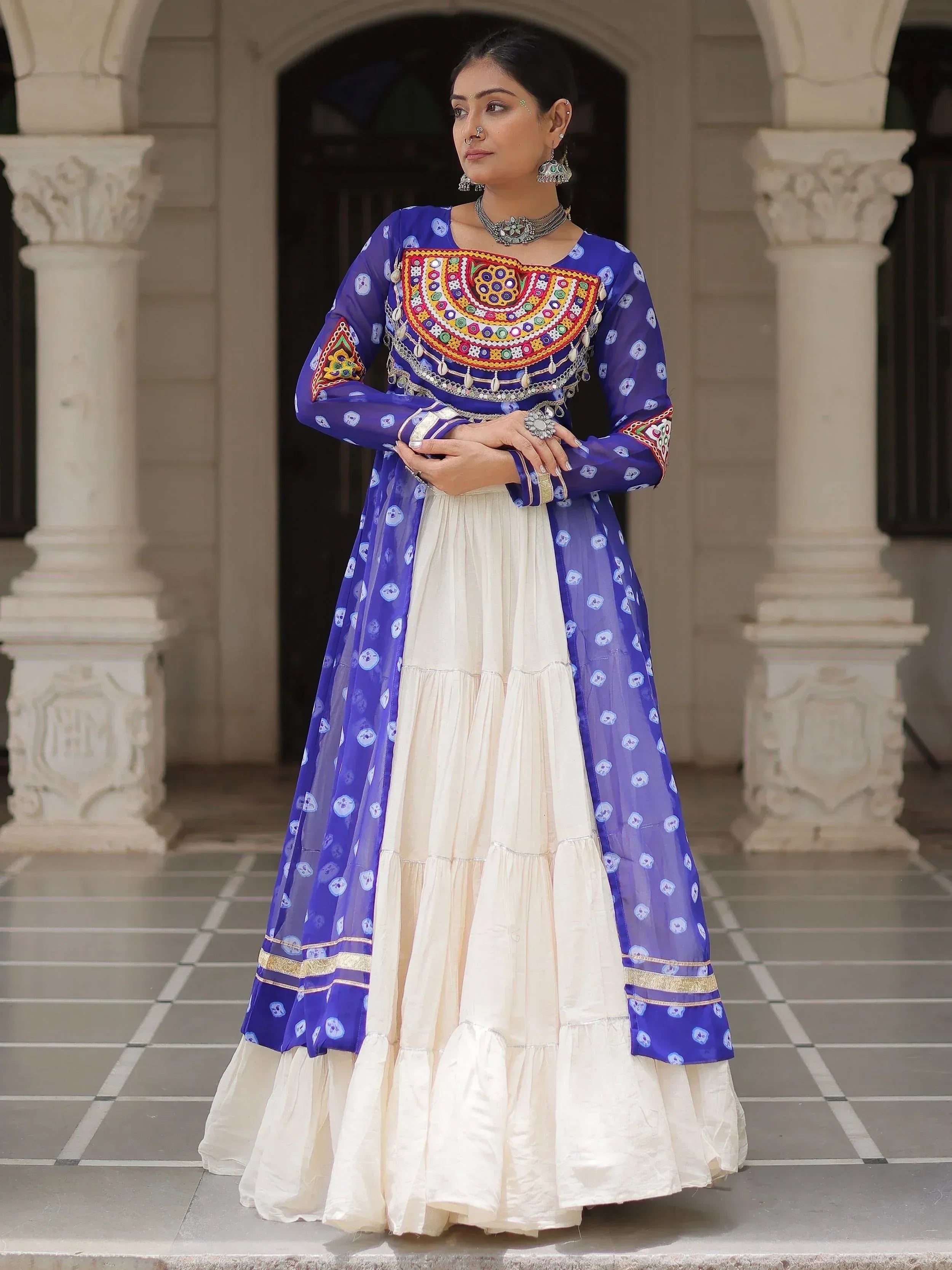 Woman in blue and cream ethnic anarkali with mirror work, perfect for Indian festivals and weddings