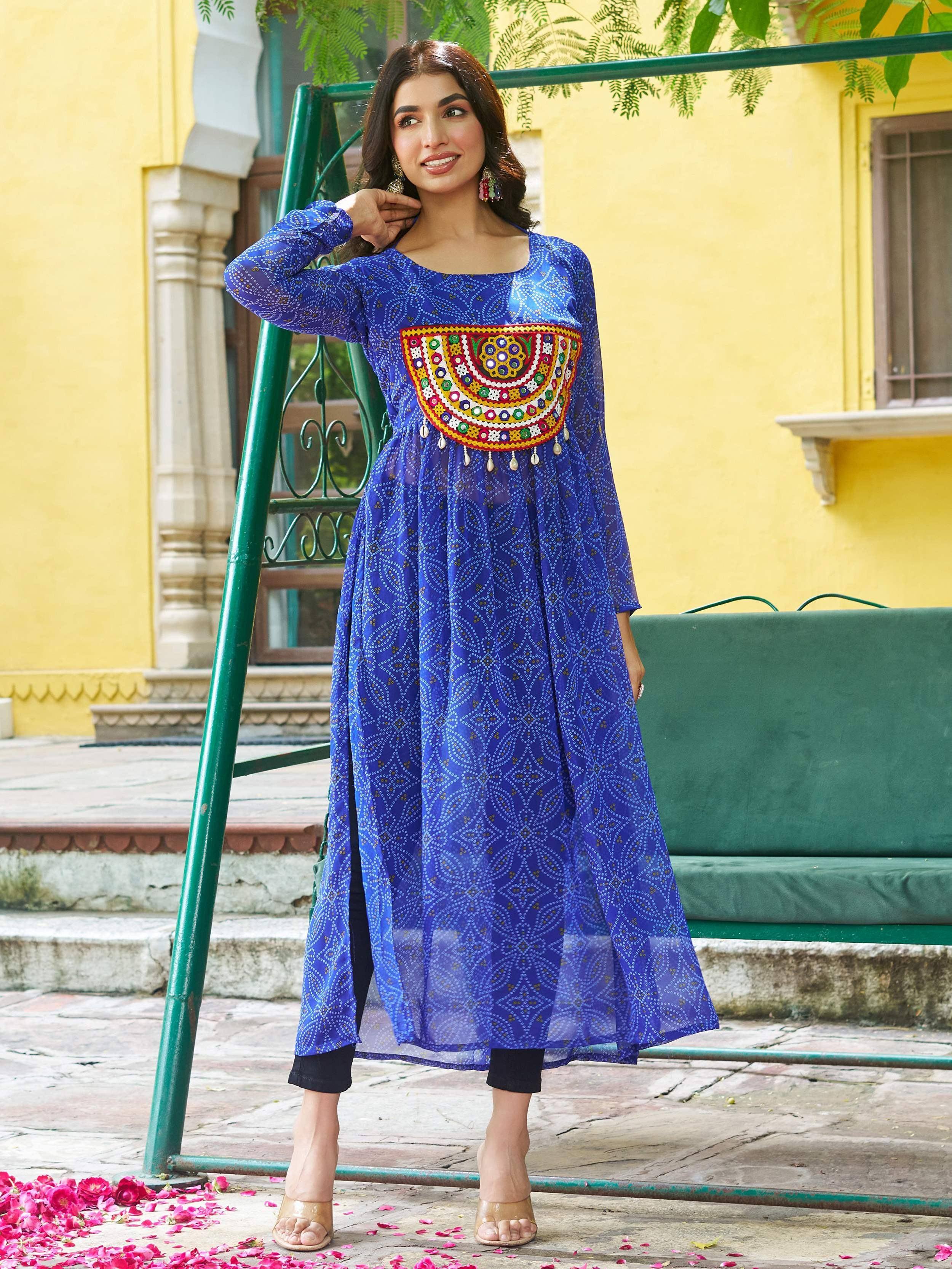 Blue ethnic kurta with colorful mirror work, paired with black pants, perfect for Indian festive wear