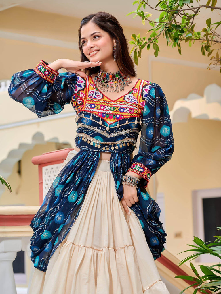 Woman in colorful embroidered Indian ethnic wear with mirror work and dupatta, perfect for festive occasions
