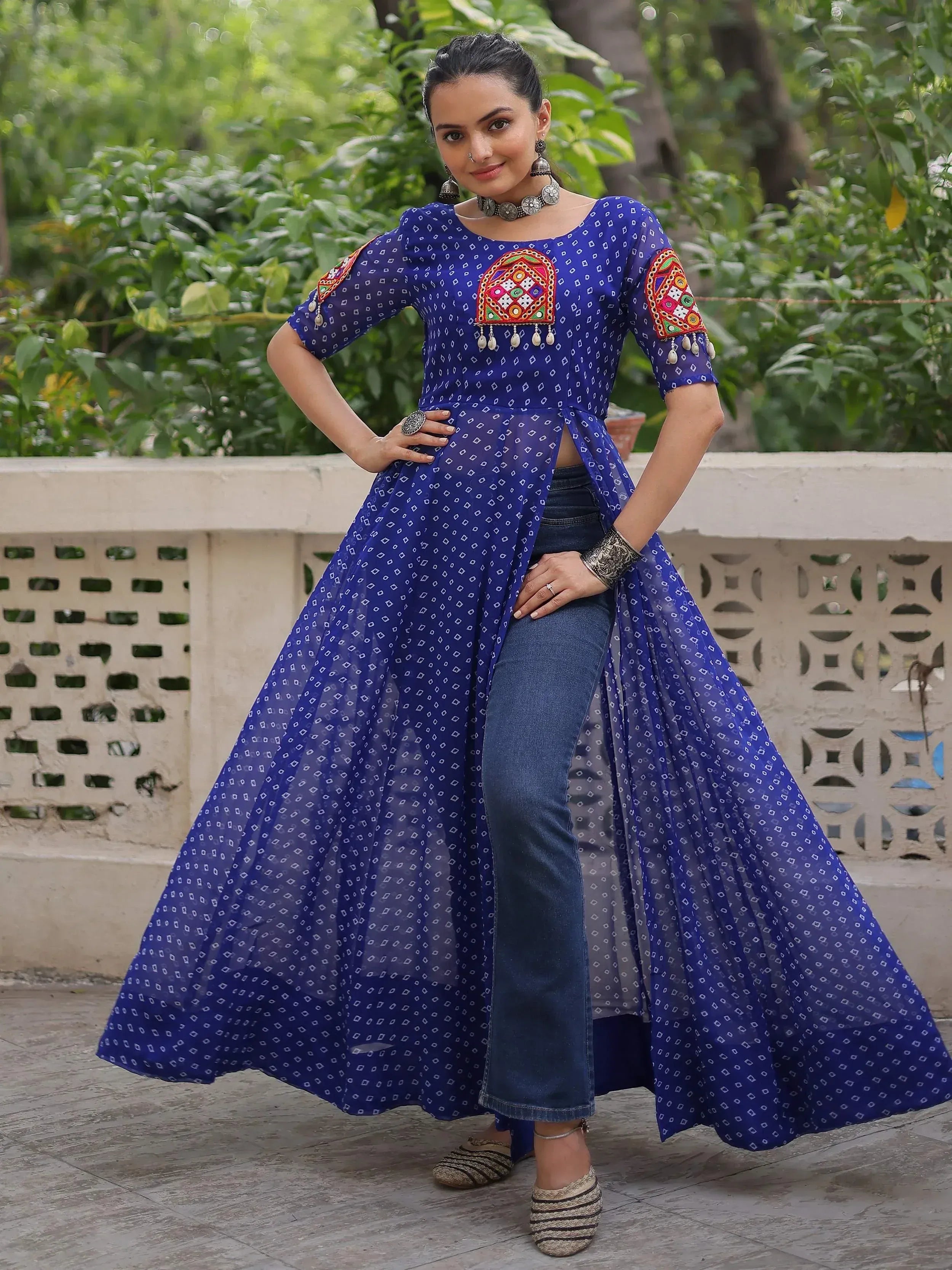 Blue embroidered ethnic kurta with denim jeans, perfect for Indian wear trends