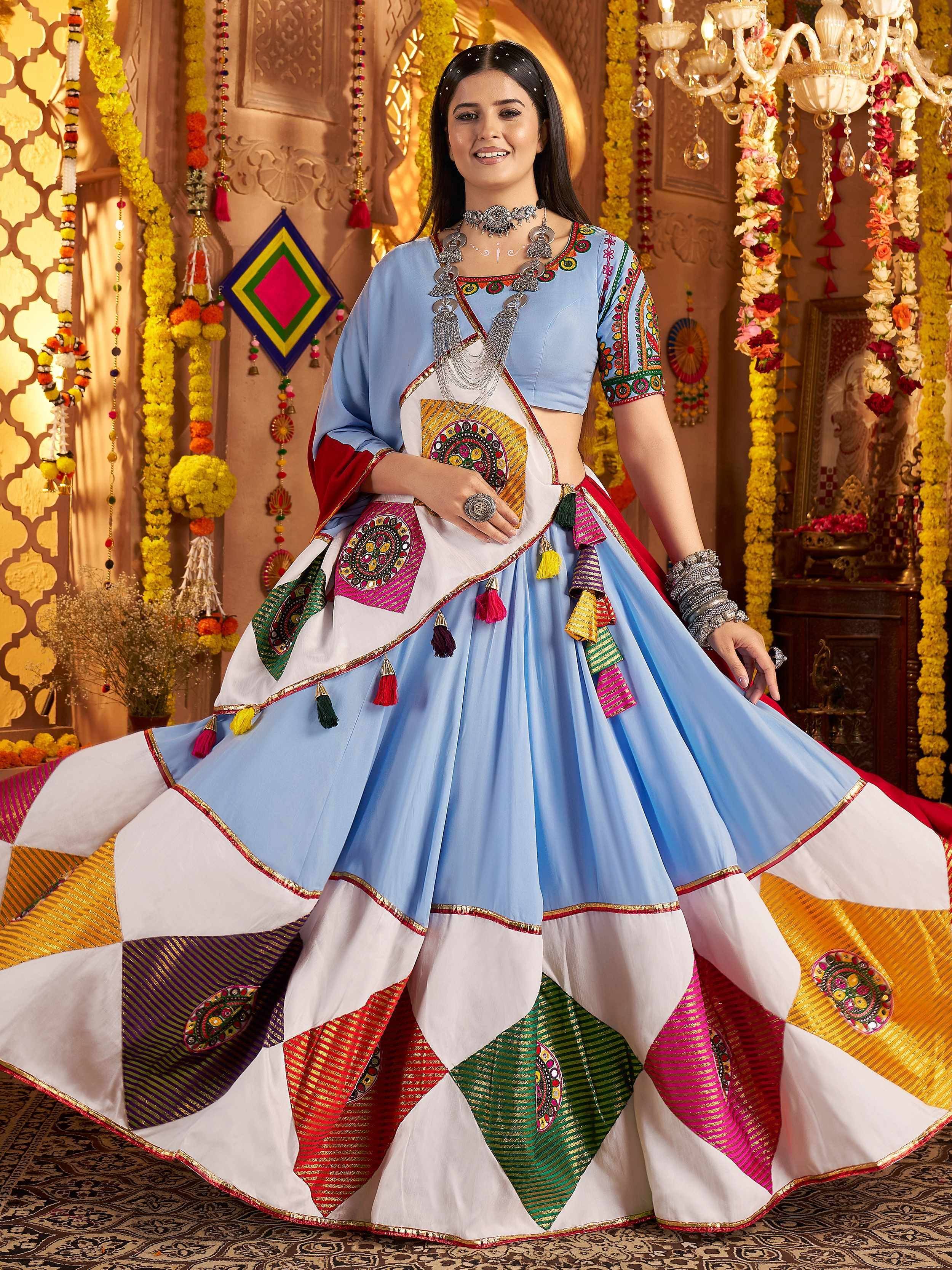 Blue and white embroidered lehenga choli with colorful patchwork, perfect for Indian ethnic wear and festive occasions