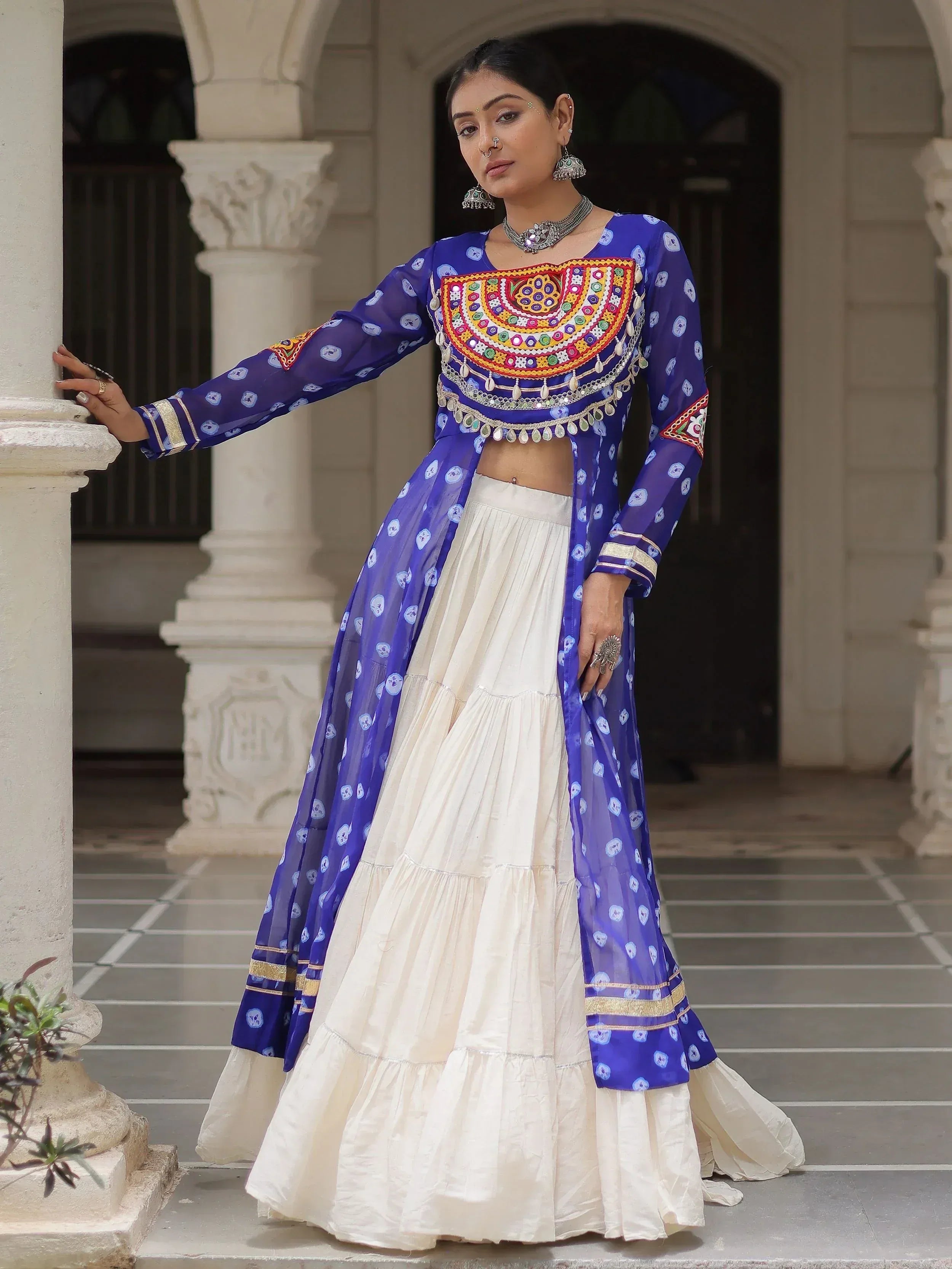 Blue embroidered lehenga choli with white skirt, traditional Indian ethnic wear for women