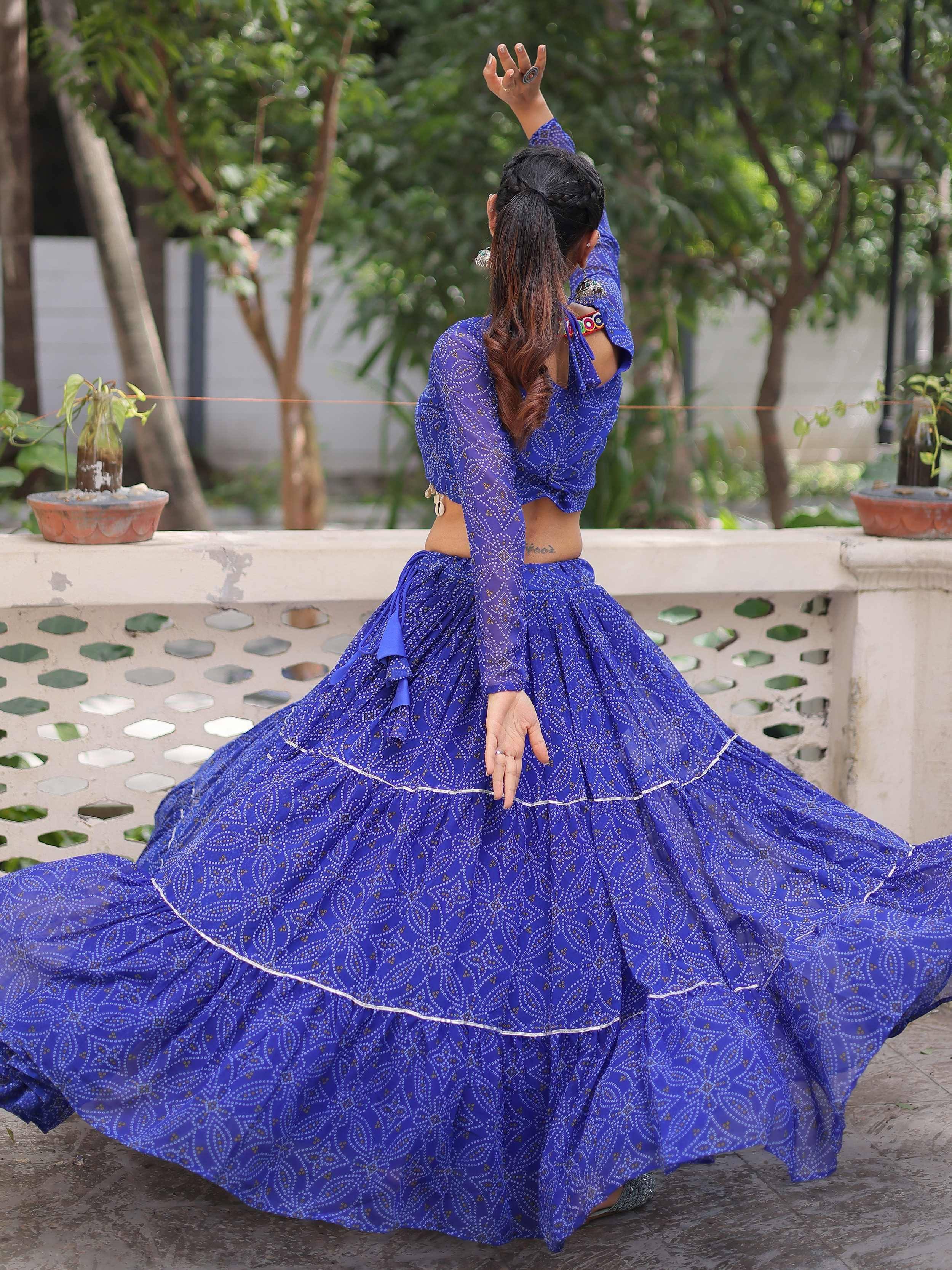 Blue printed lehenga choli with flared skirt, perfect for Indian ethnic wear and festive occasions.