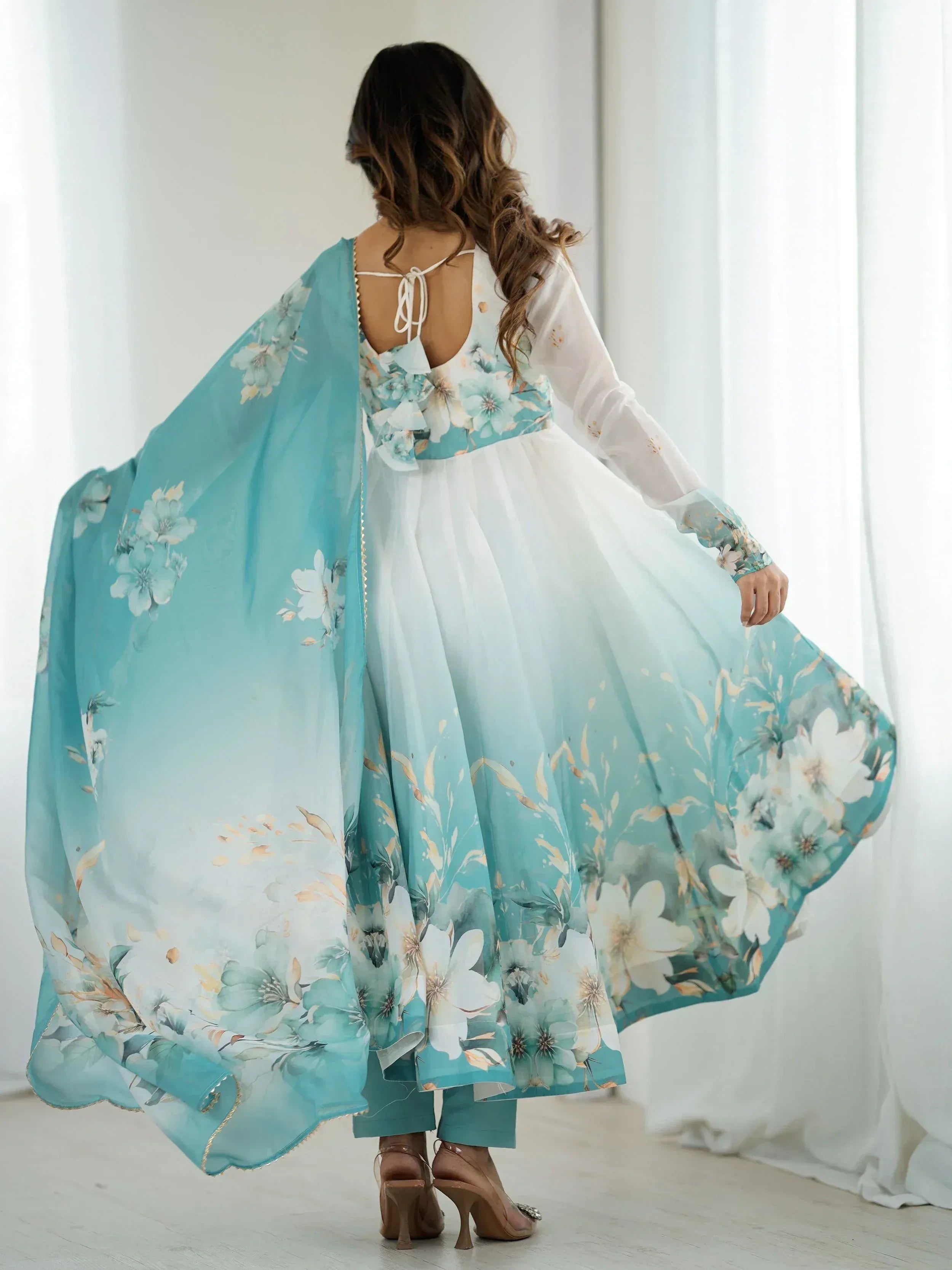 Floral print ethnic gown with back tie detail and matching dupatta, ideal for Indian occasions