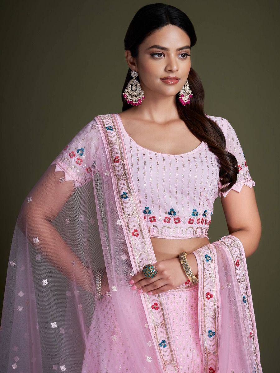 Pink embroidered lehenga choli with floral motifs and sheer dupatta, Indian ethnic wear