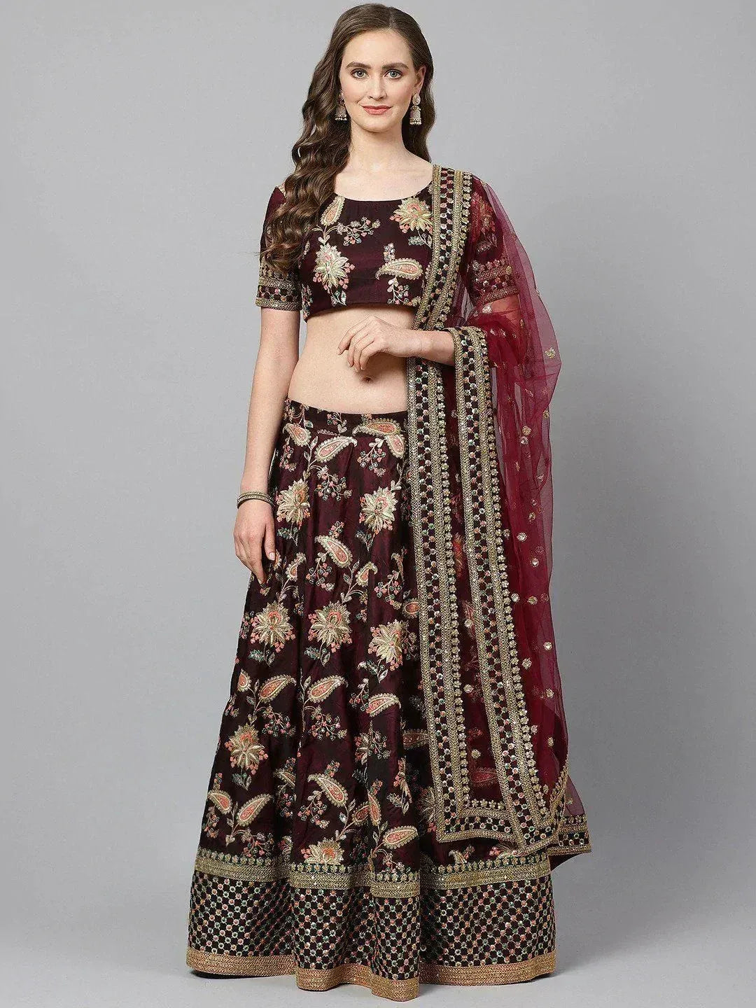 Maroon embroidered lehenga choli with floral and paisley design, perfect for Indian ethnic wear occasions
