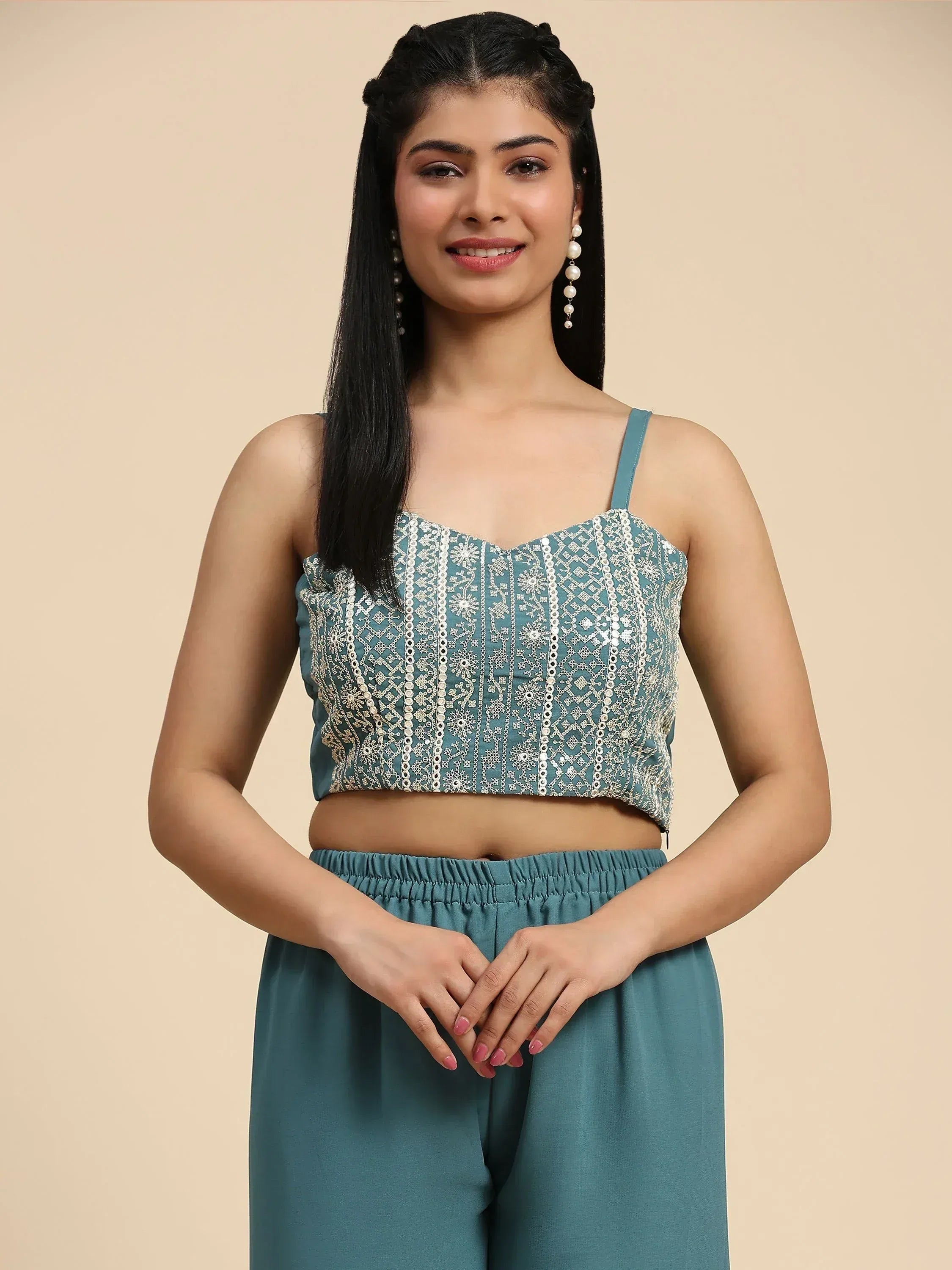 Teal embroidered crop top with matching palazzo pants, perfect for ethnic wear