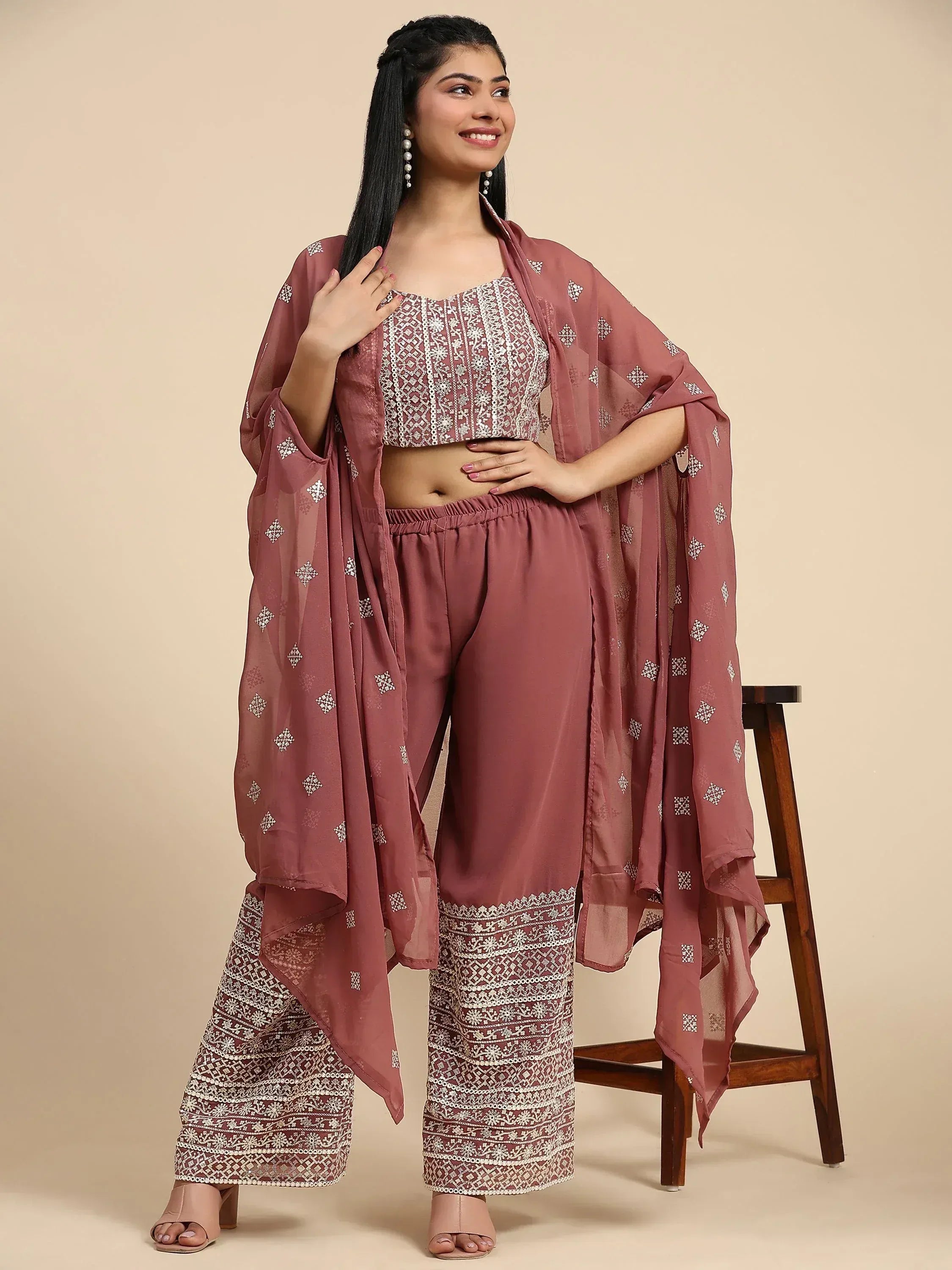 Woman in mauve embroidered Indian ethnic crop top, palazzo pants, and dupatta set