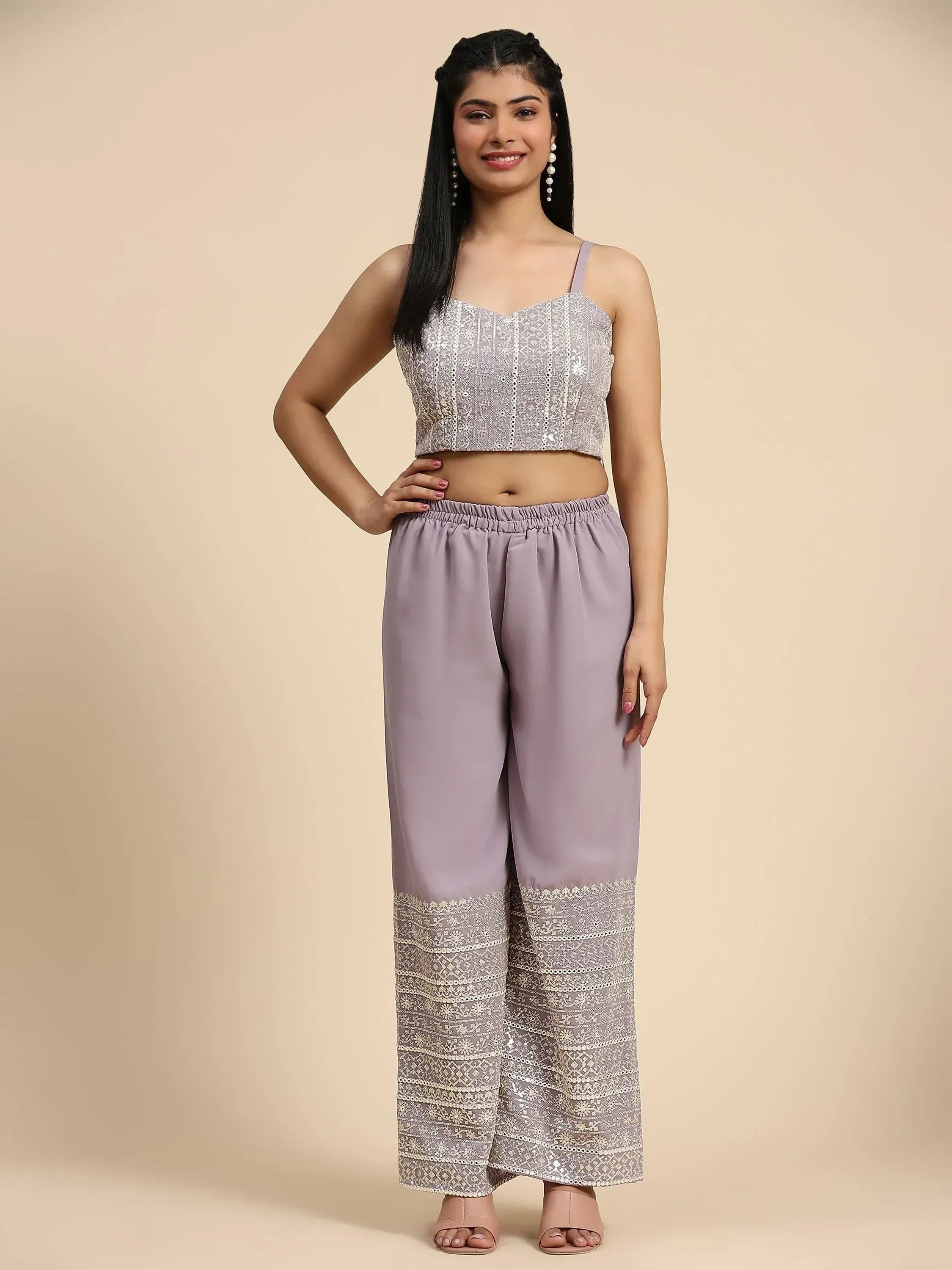 Woman wearing lilac ethnic crop top and wide-leg palazzo pants with sequin embroidery