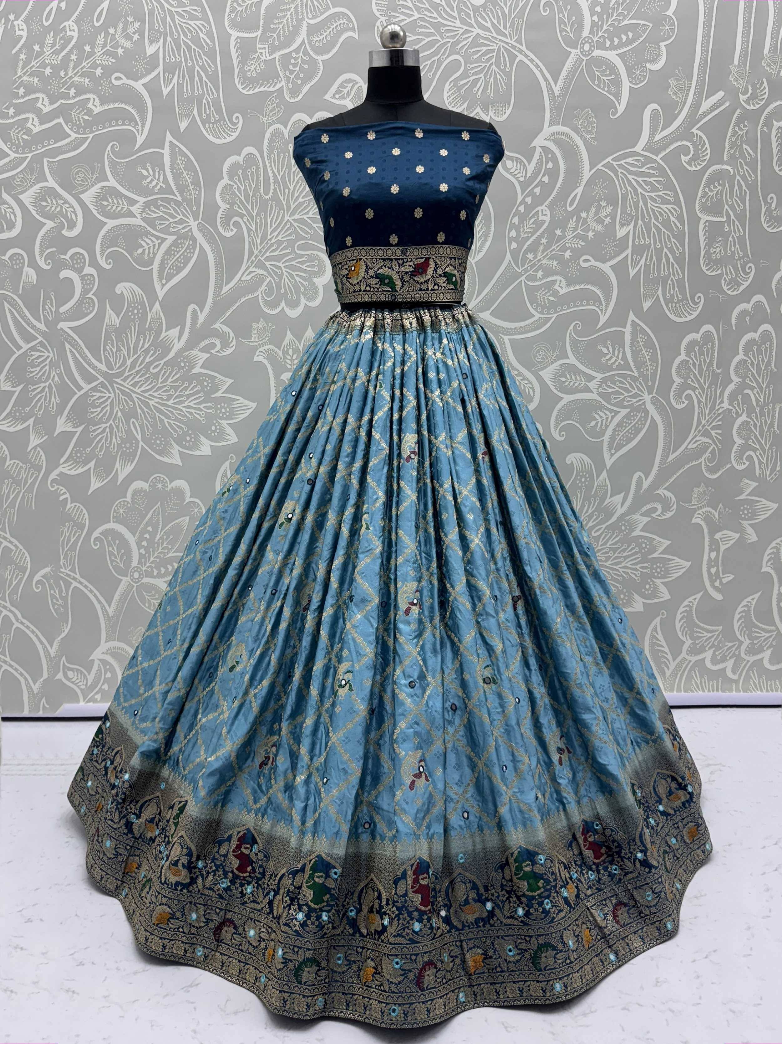 Blue designer lehenga choli with gold embroidery and floral border, ethnic Indian wear