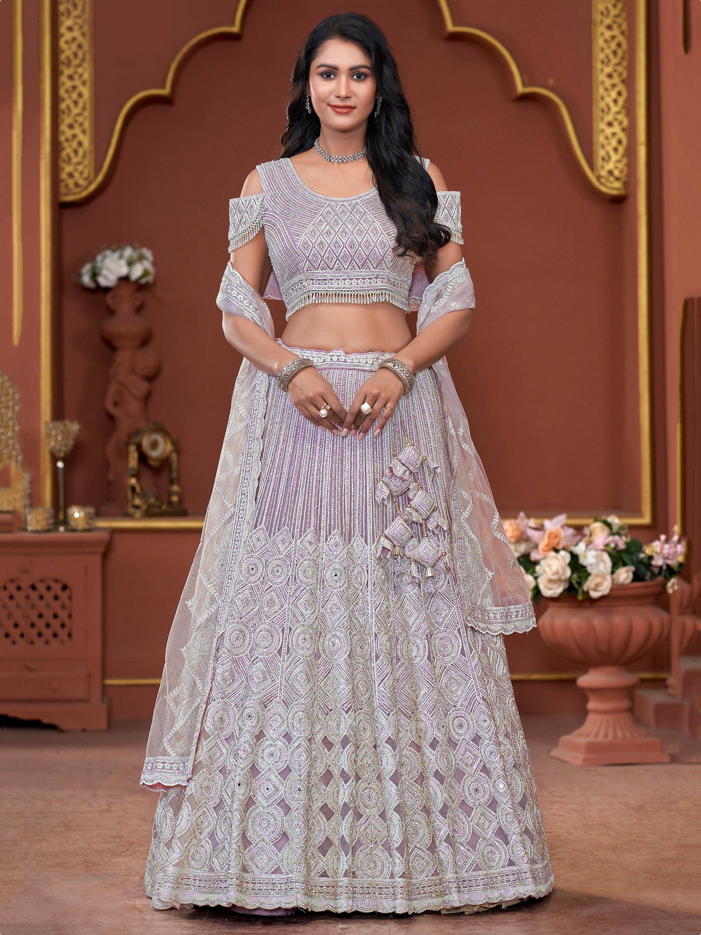 Elegant lavender designer lehenga choli with intricate embroidery and cold shoulder blouse for Indian weddings