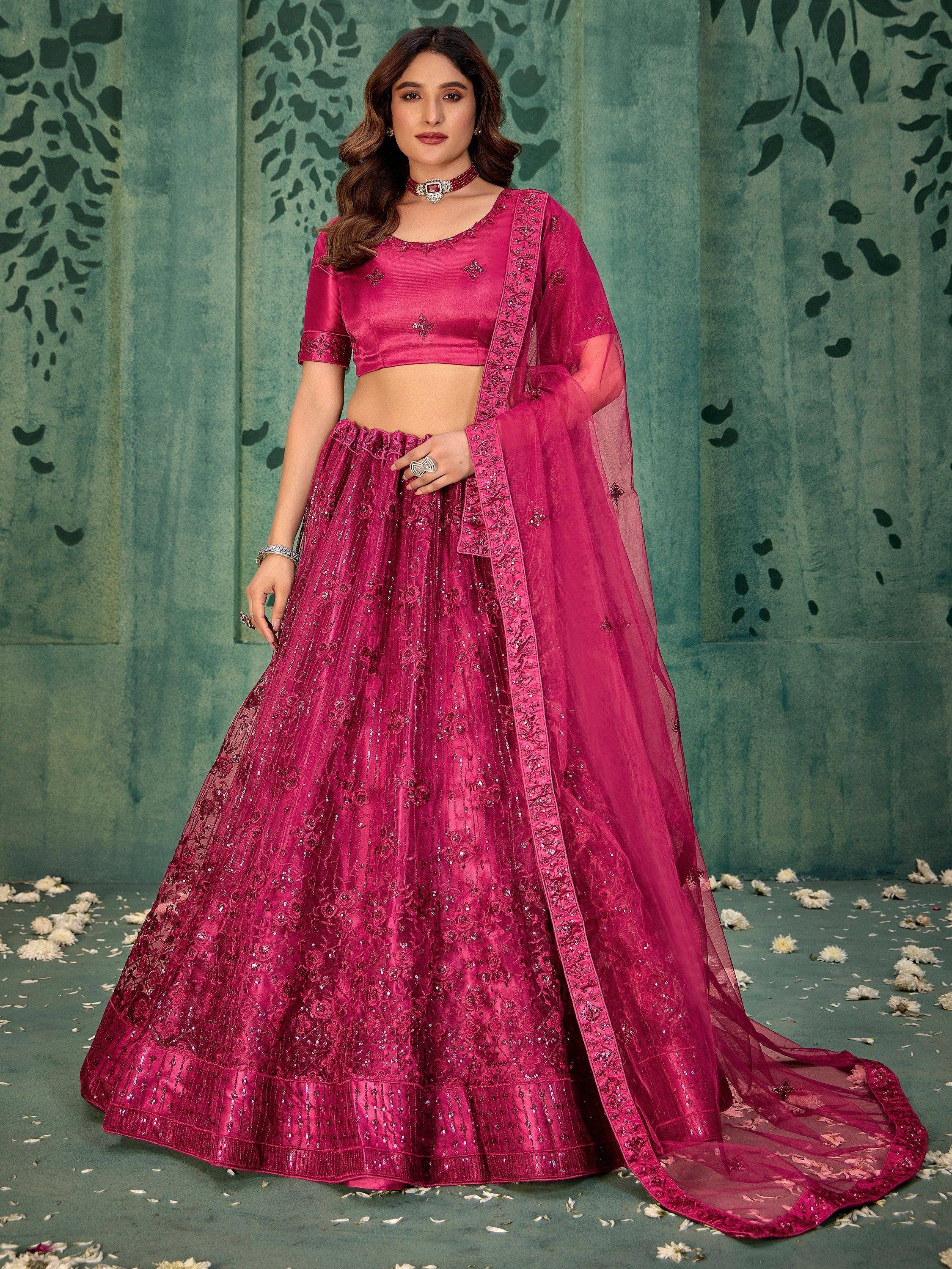Fuchsia pink embroidered lehenga choli with sheer dupatta, perfect for Indian ethnic wear occasions