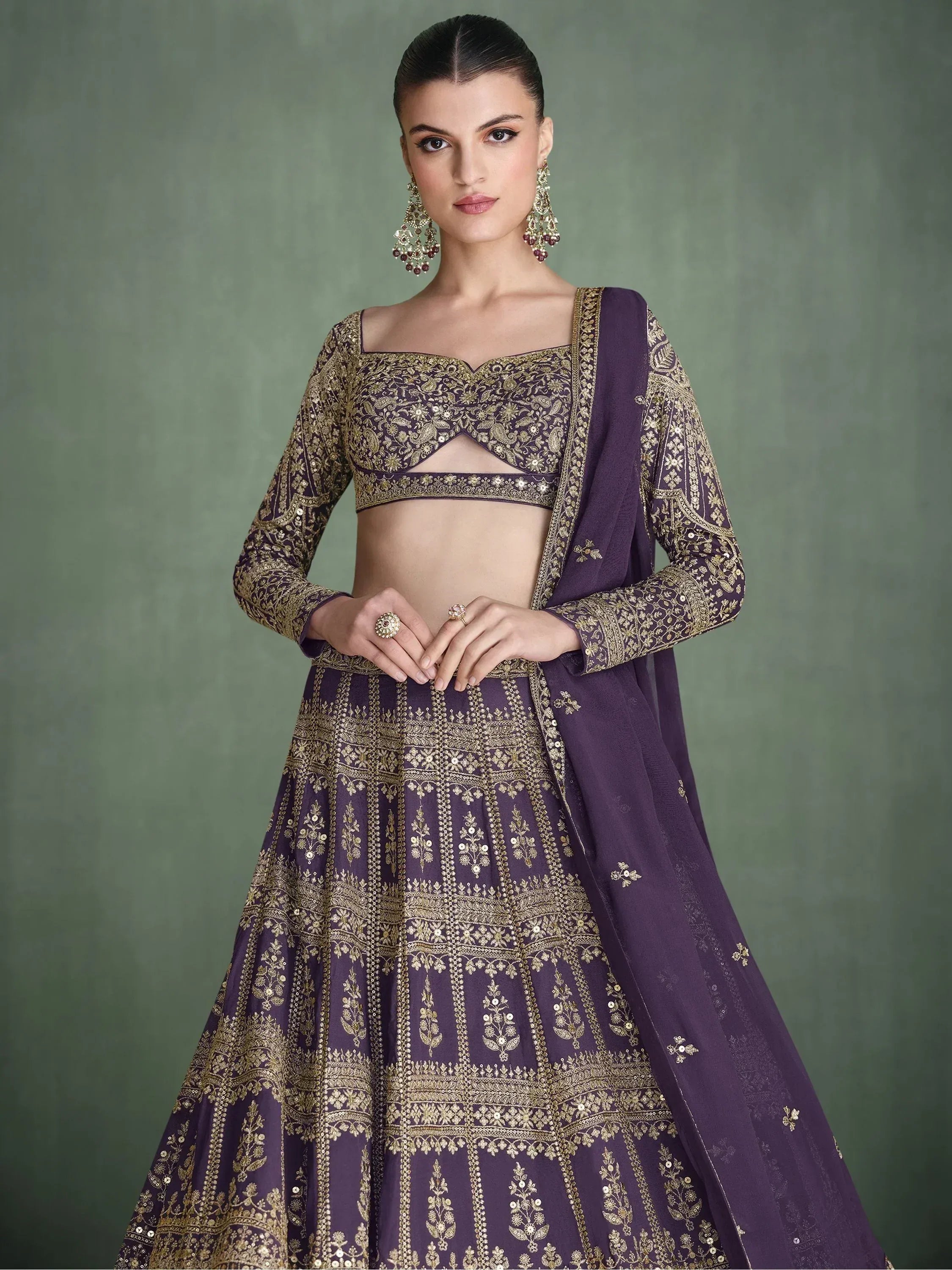 Purple designer lehenga choli with gold embroidery, perfect for Indian ethnic wear and weddings.