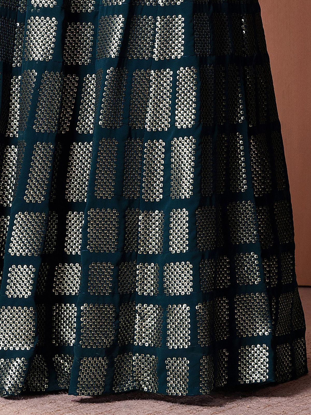 Teal ethnic skirt with silver geometric sequin patterns, ideal for Indian designer lehenga or saree sets