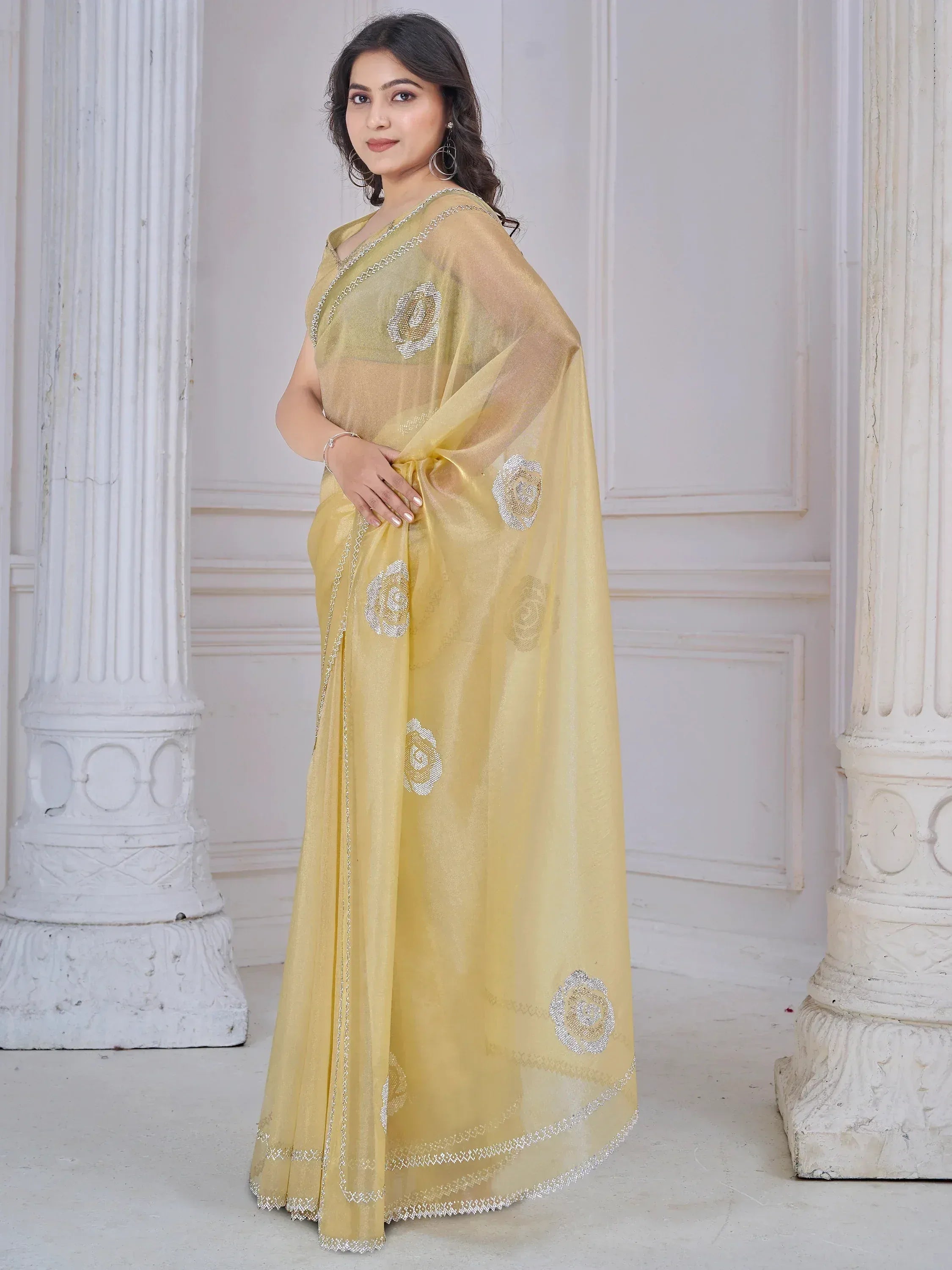 Yellow designer saree with floral embroidery and sequin detailing, perfect for ethnic occasions
