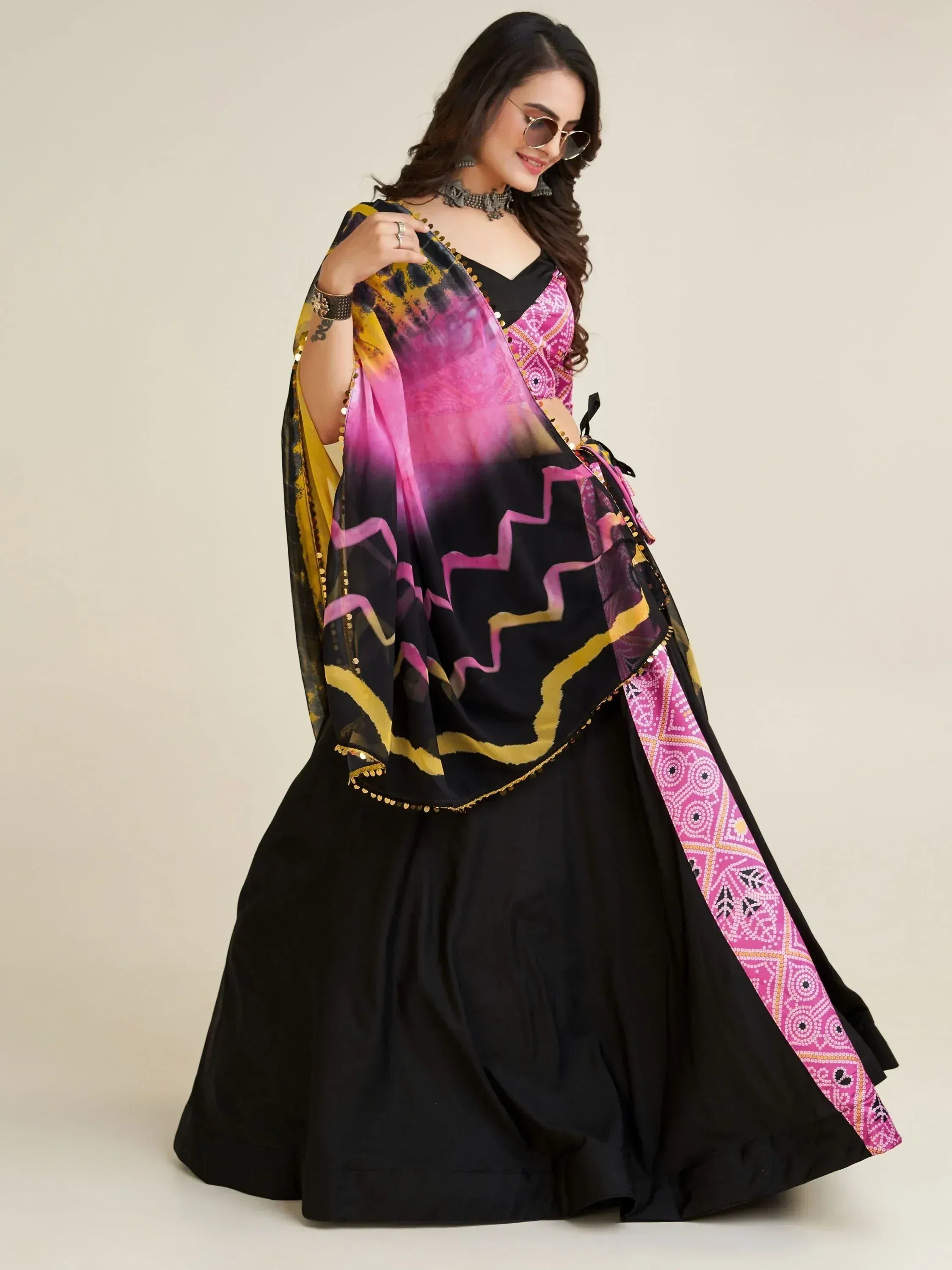 Black lehenga choli with pink and gold printed dupatta, ethnic wear for women