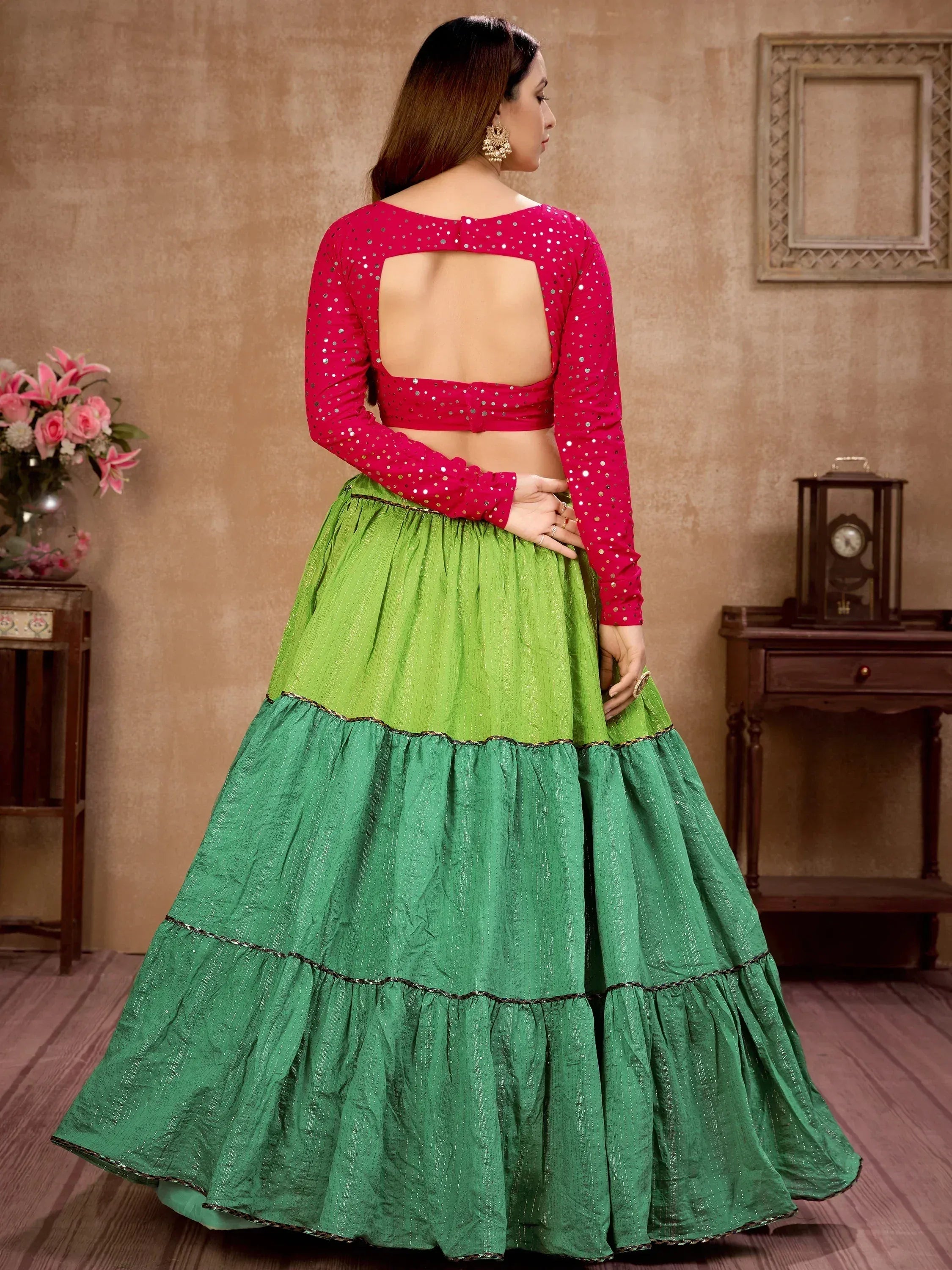 Green tiered lehenga with pink sequin blouse, back view, Indian ethnic wear