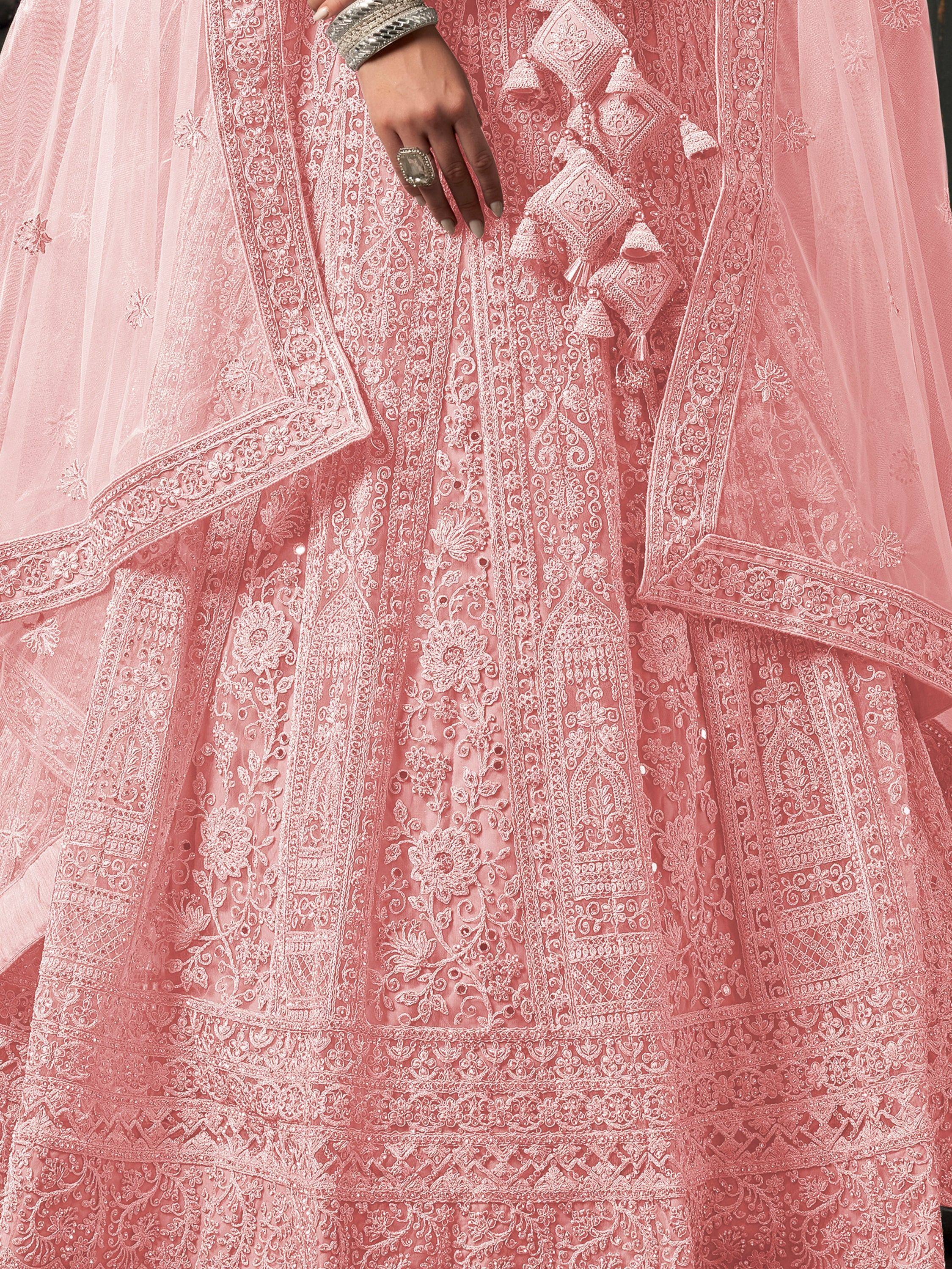 Pink embroidered lehenga choli with floral lace and tassels, perfect for Indian ethnic wear