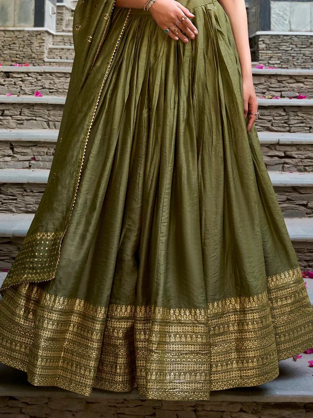 Olive green ethnic lehenga with gold embroidery, perfect for Indian weddings and festive occasions