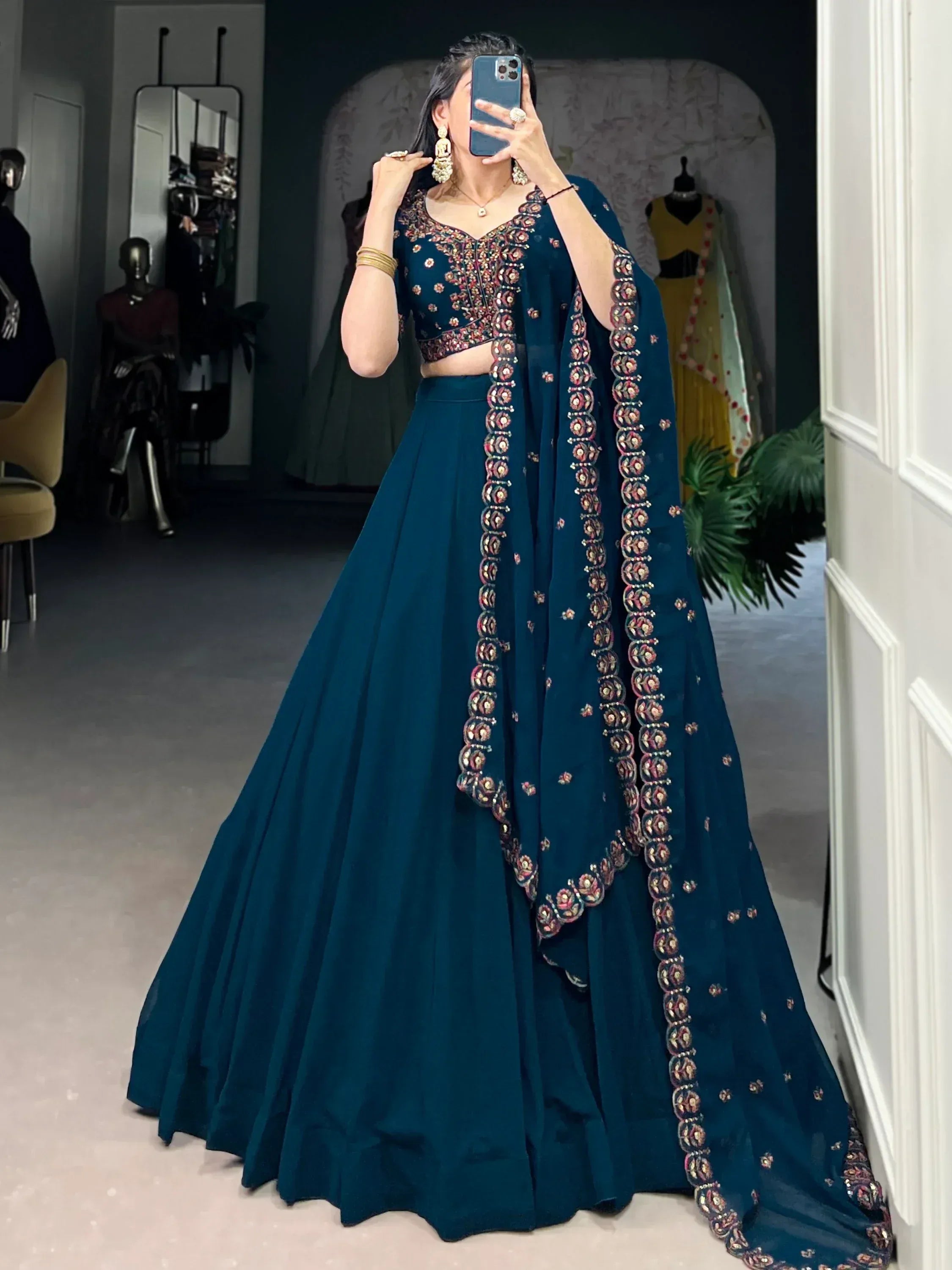 Teal embroidered lehenga choli with floral detailing, perfect for Indian ethnic wear occasions