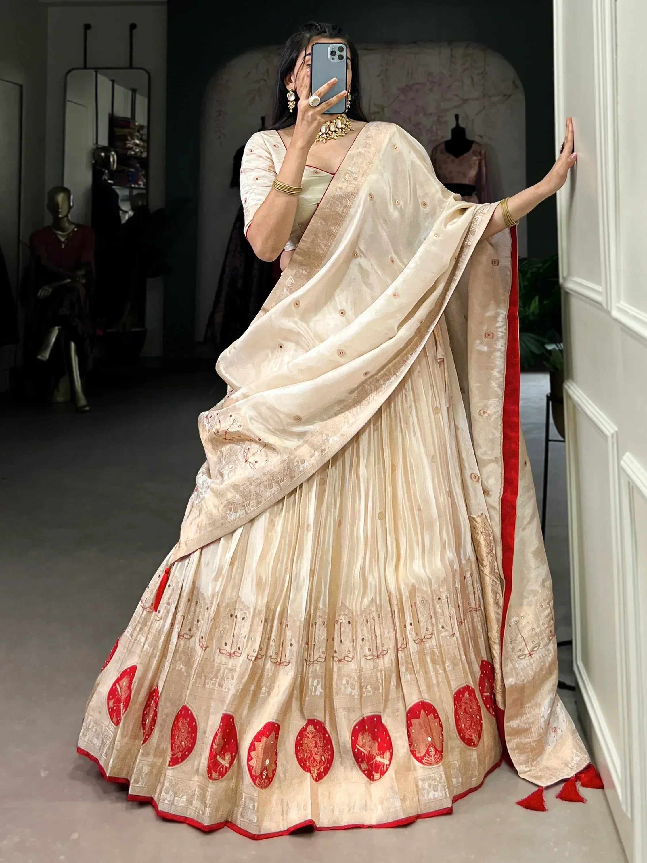 Cream and red embroidered lehenga choli with dupatta, perfect for Indian ethnic wear occasions