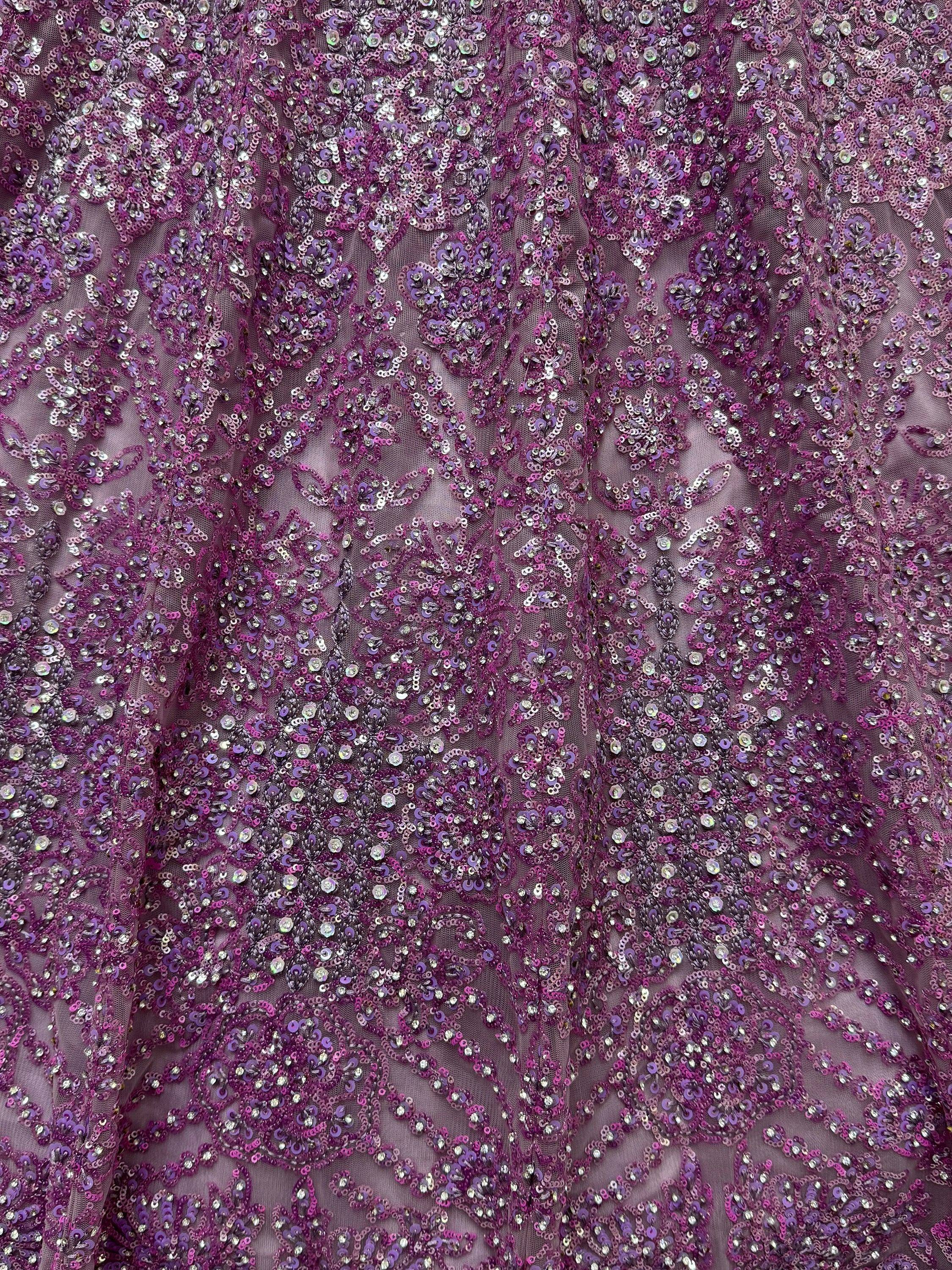 Purple sequin-embellished ethnic gown fabric with intricate floral patterns, perfect for designer lehenga choli or saree.